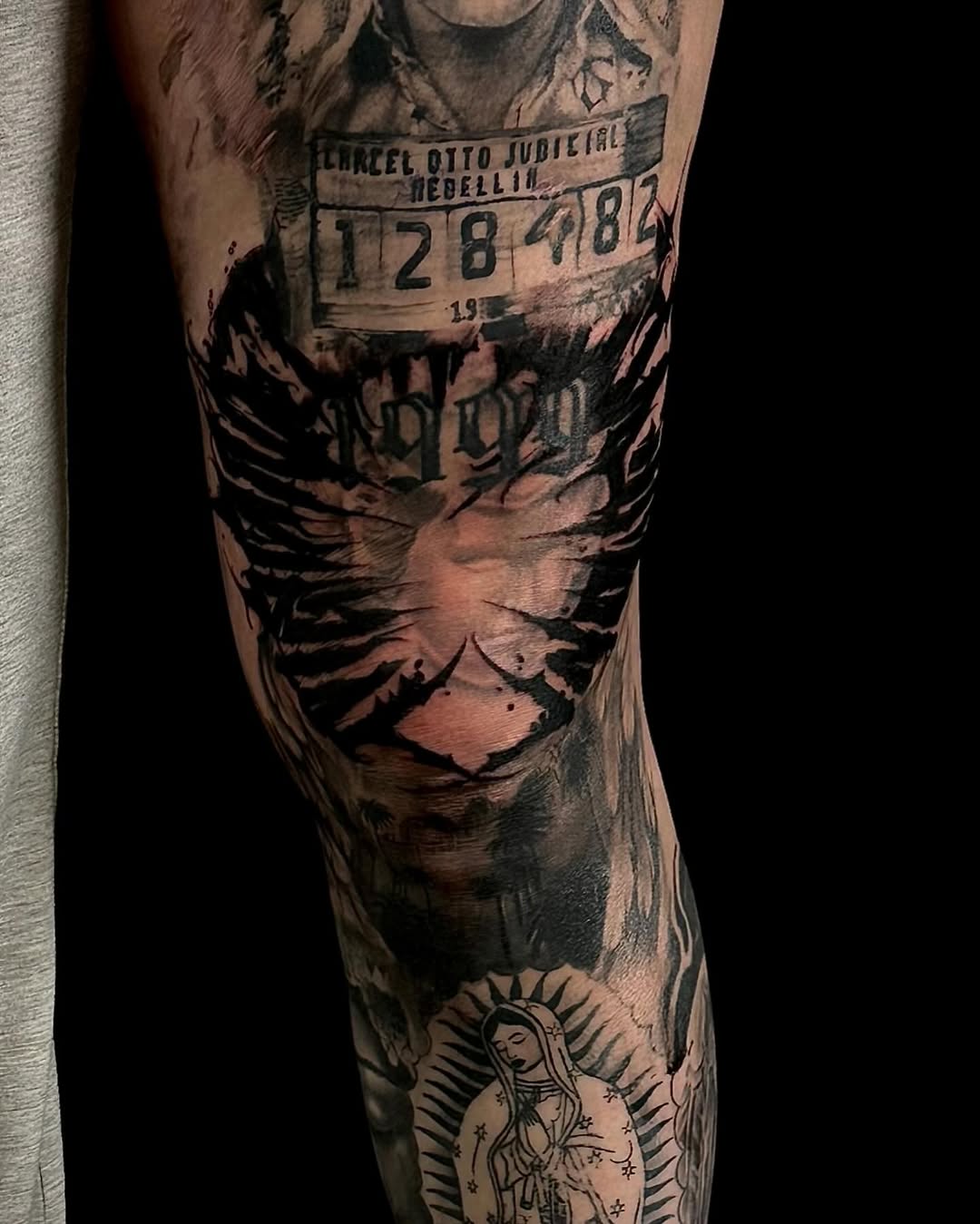Mugshot and eagle Chicano tattoo on the forearm by Las vegas tattoo artist
