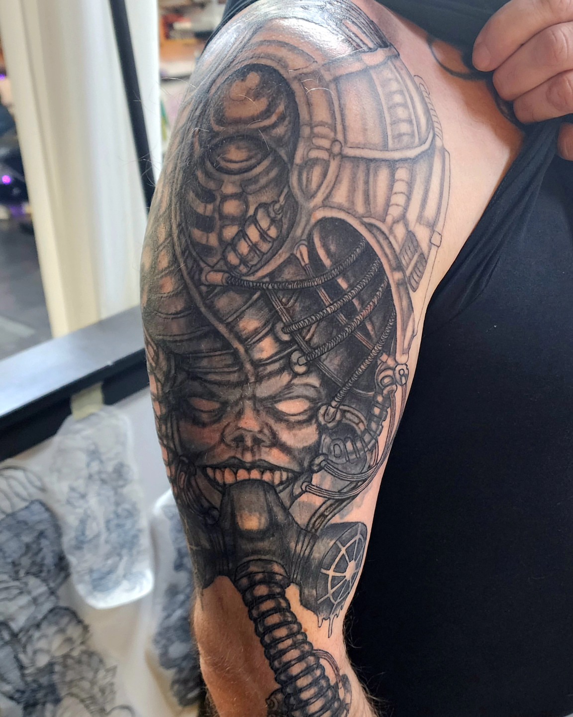 Cyborg head realism tattoo on the shoulder by Scott Fricke