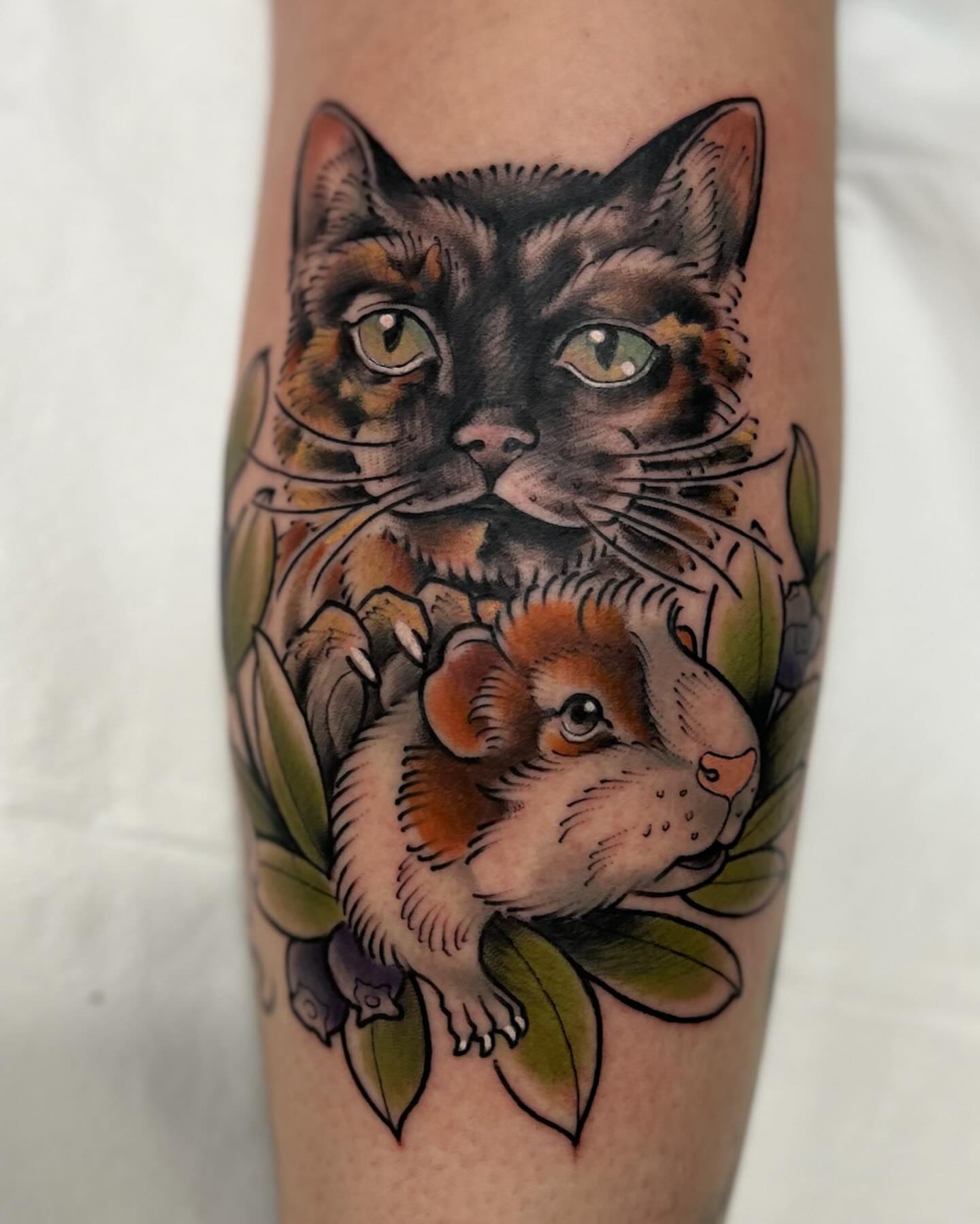 Cat and chinchilla realism tattoo on the forearm by Kyle Olson, Salt Lake City, Utah