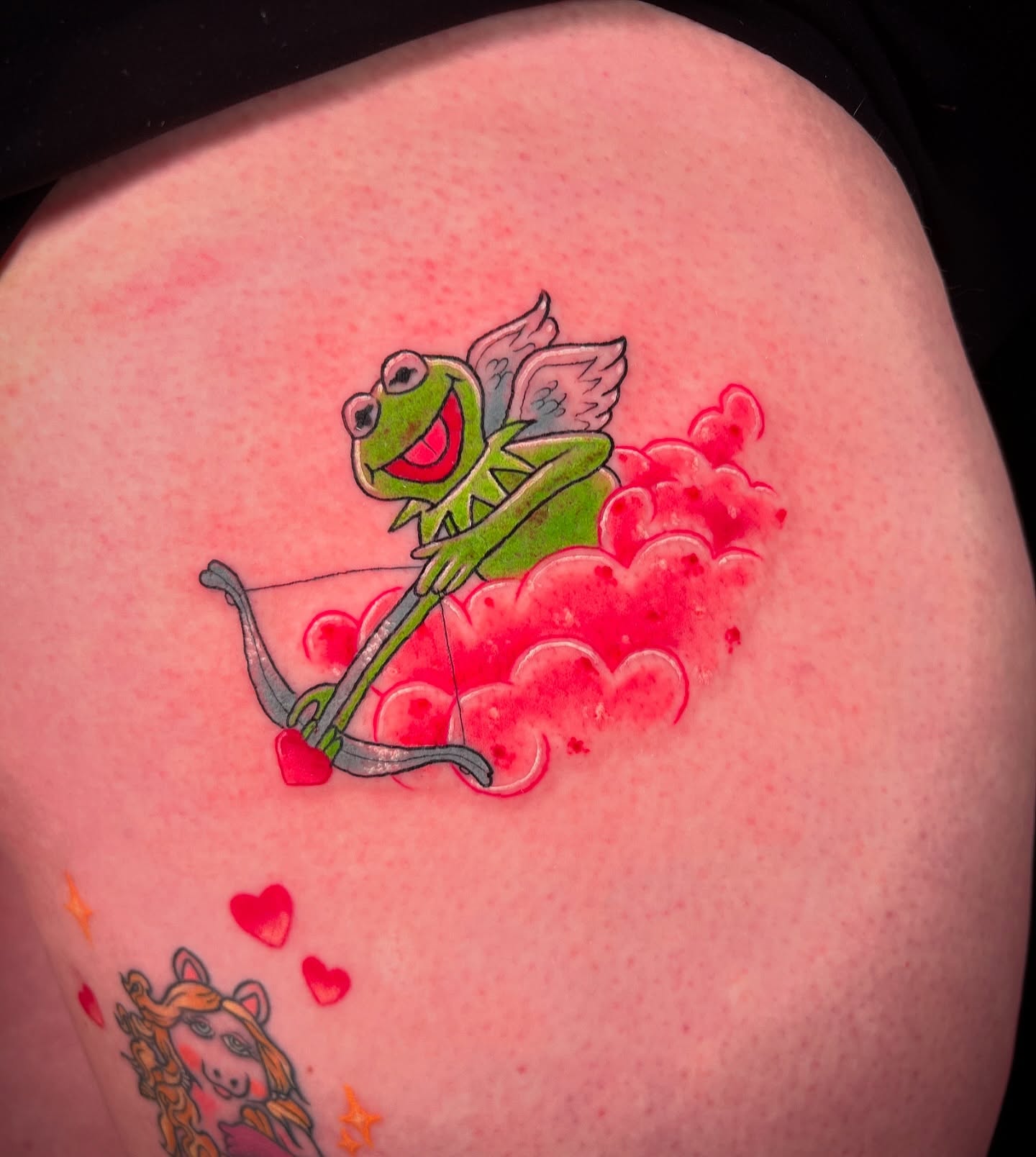 Kermit the Frog as Cupid new school tattoo on the thigh by Tattoo & Body Artist, Gastonia, North Carolina