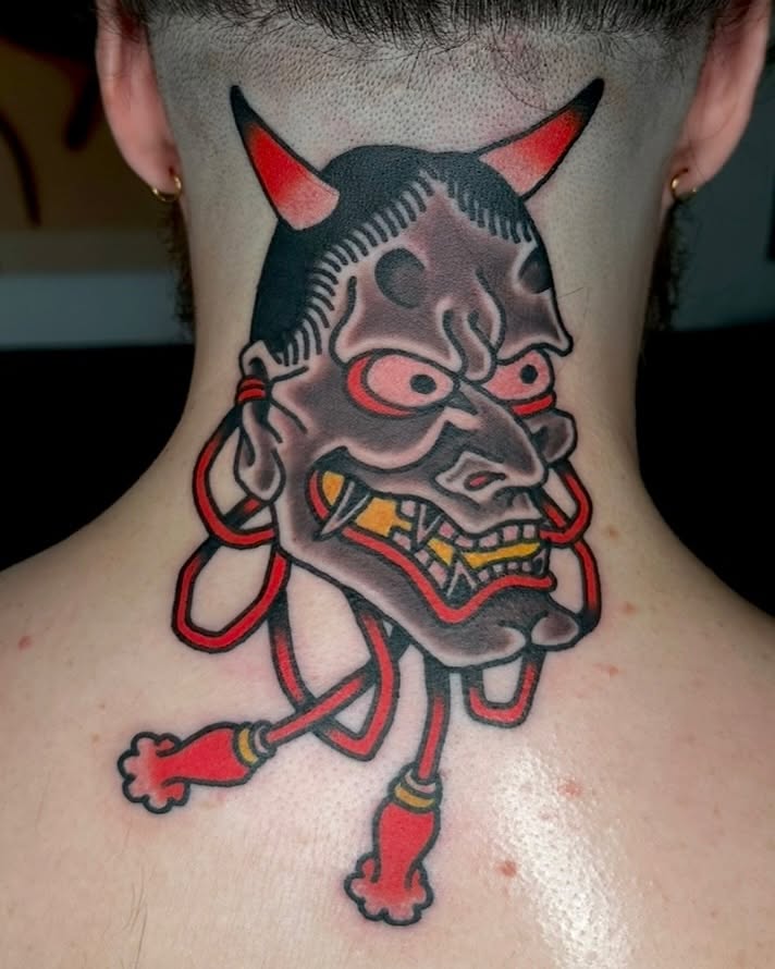 Demon mask American traditional tattoo on the neck by Steve Pearson