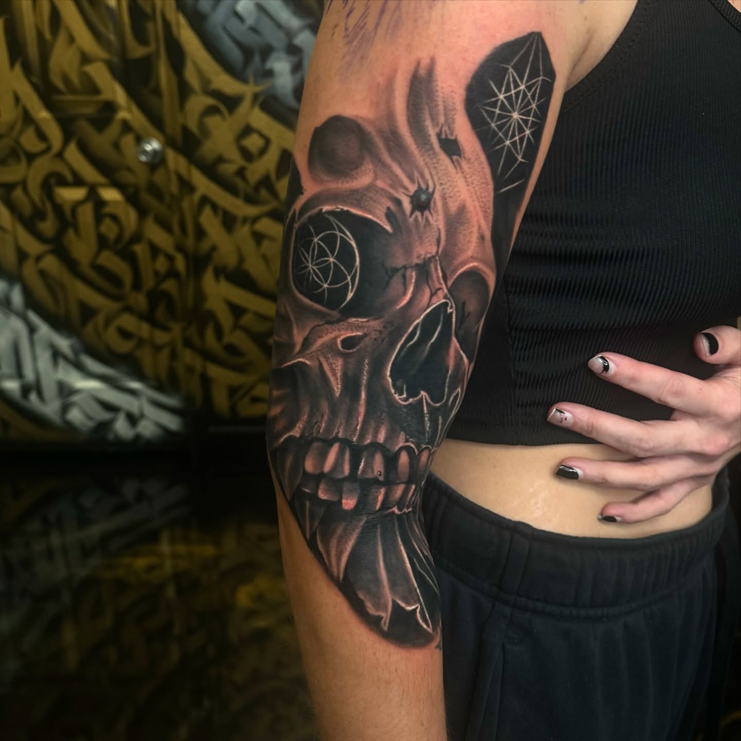 Skull realism tattoo on the forearm by Fernando Luna