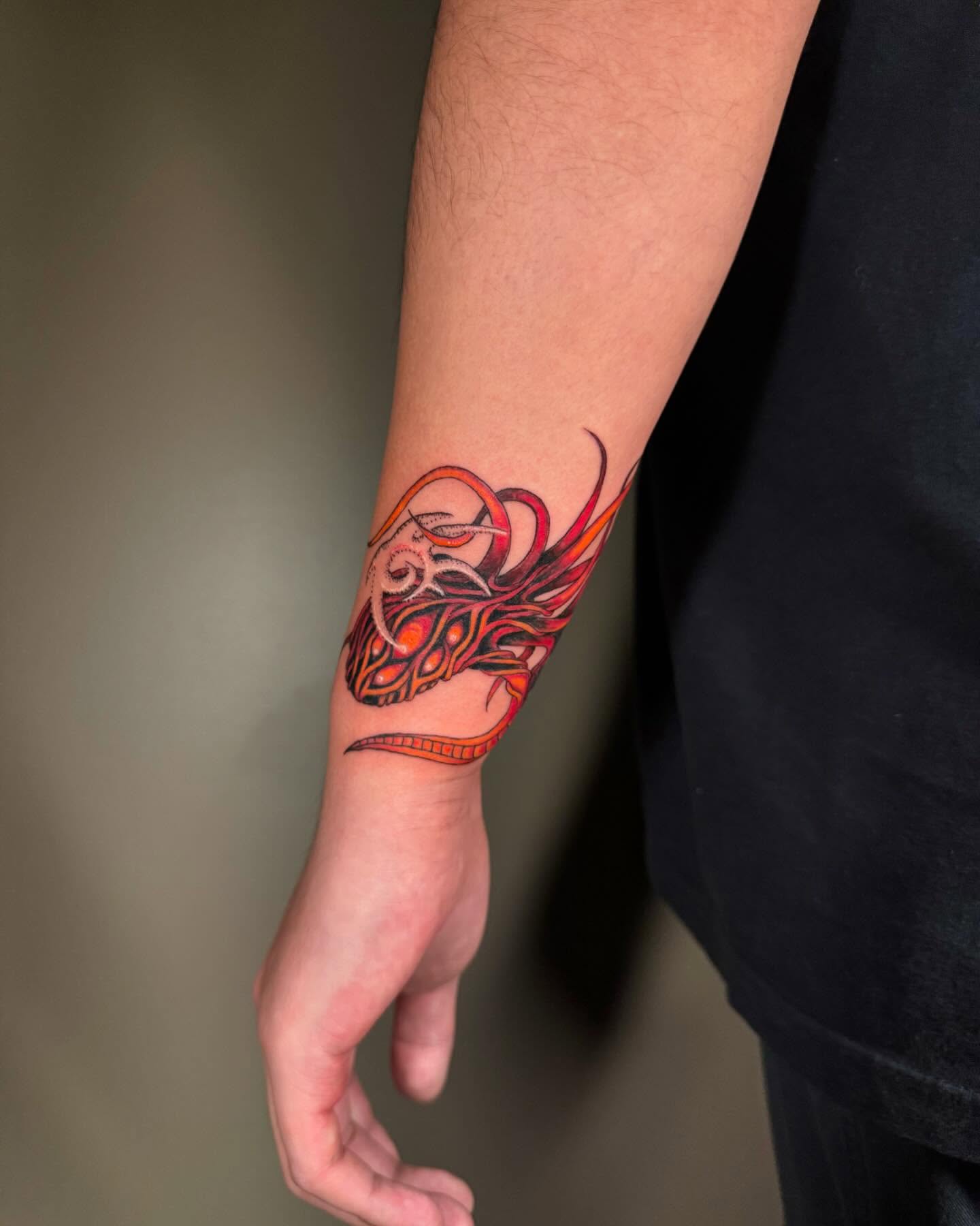 Flame neo-traditional tattoo on the forearm by Diana