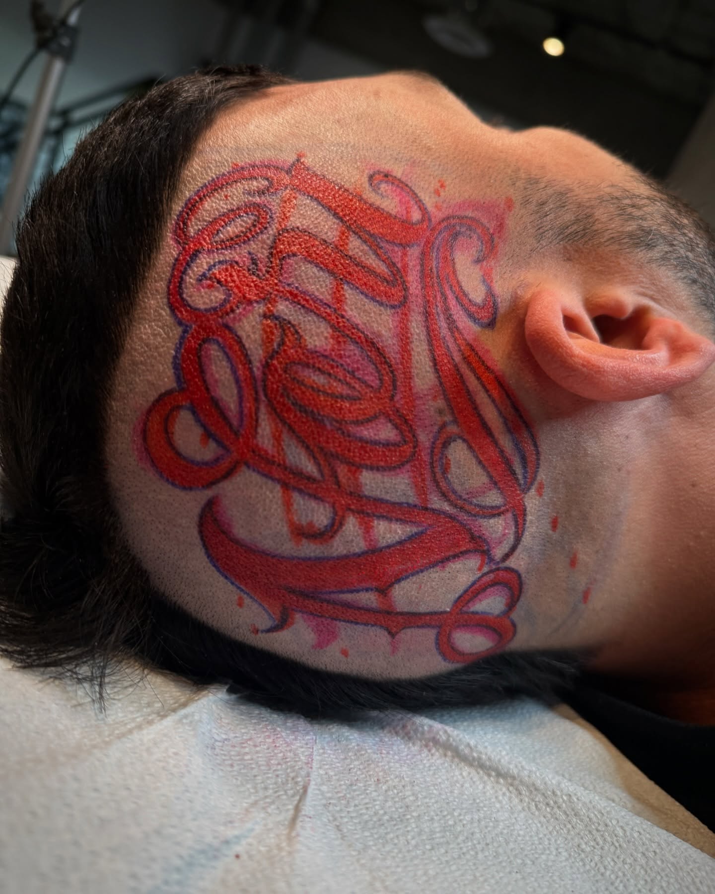 Script lettering lettering script tattoo on the neck by Aleckzi Ramos