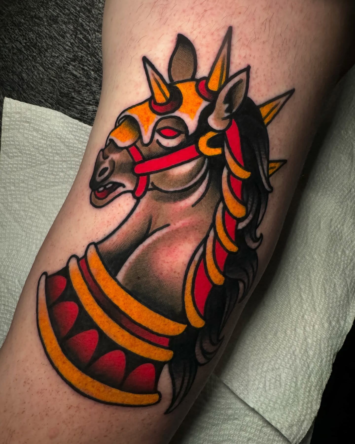 Unicorn American traditional tattoo on the forearm by Cory Cartwright
