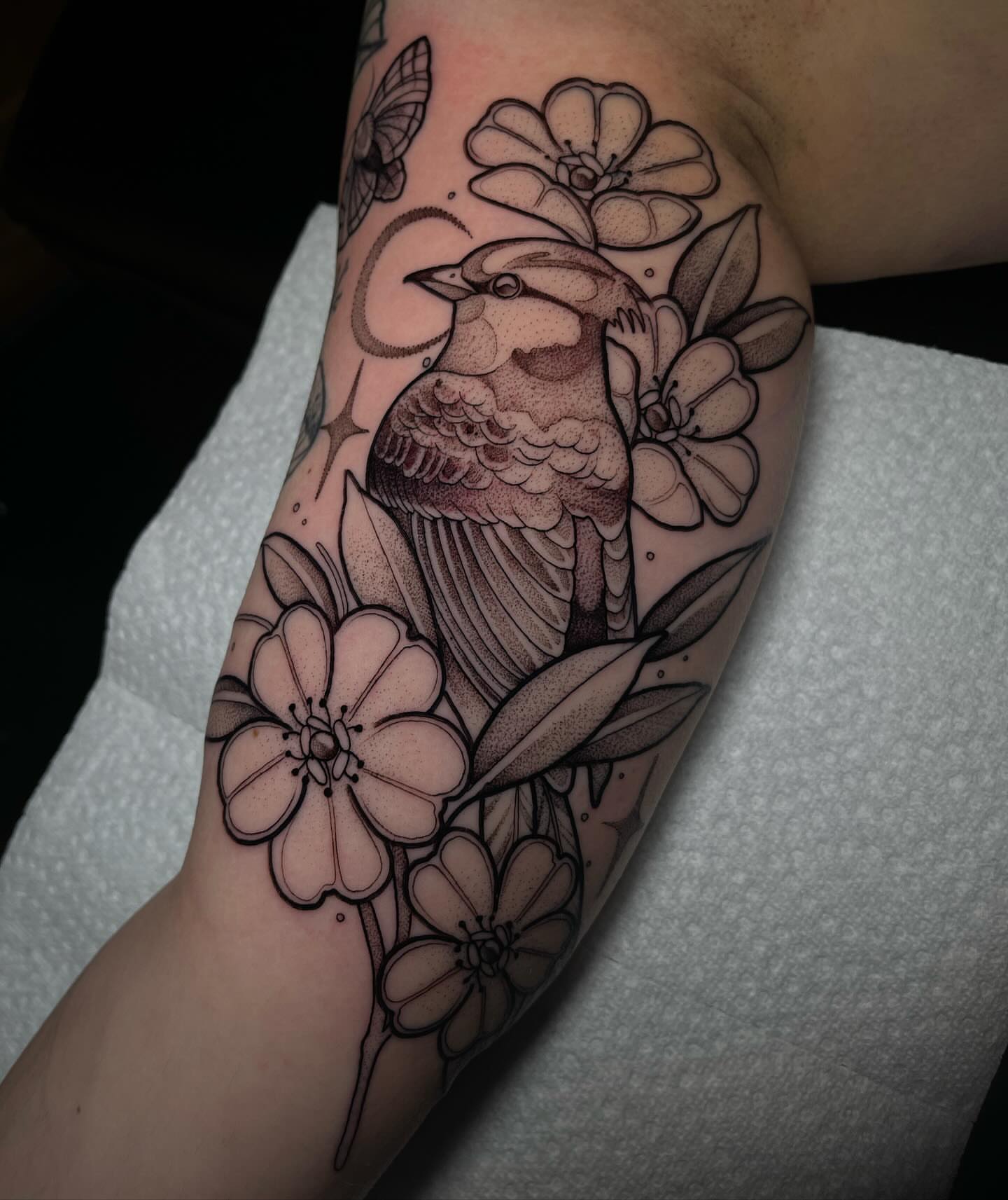Bird and flowers dotwork tattoo on the forearm by H A N N A H, Colorado Springs, Colorado