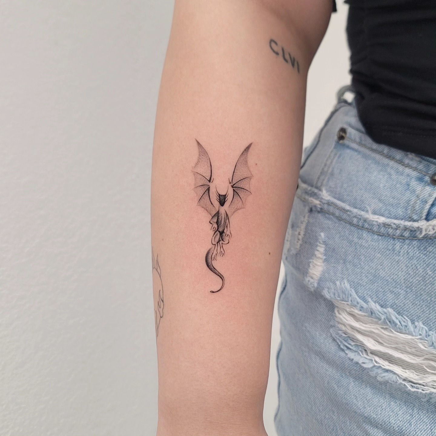 Dragon dotwork tattoo on the forearm by Las Vegas Fine Line Tattoos