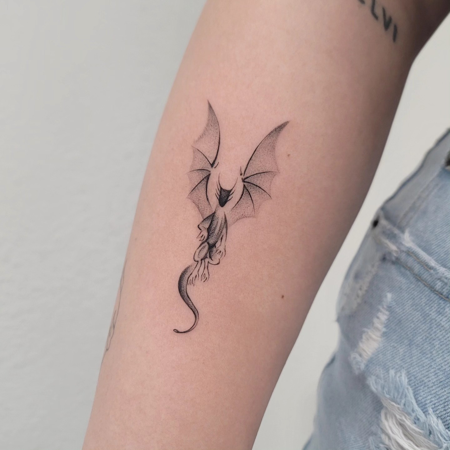 Dragon dotwork tattoo on the forearm by Las Vegas Fine Line Tattoos