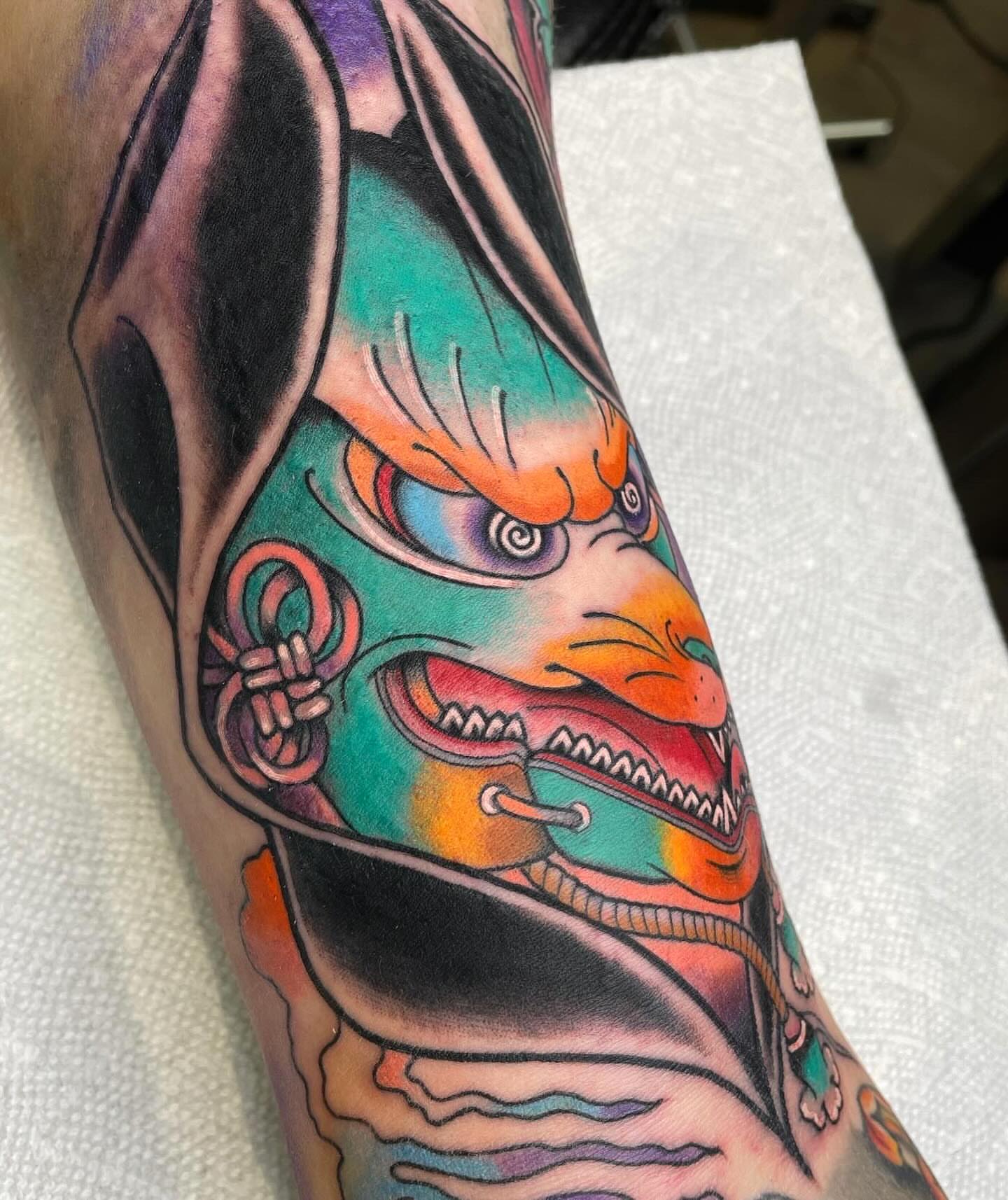 Demon mask American traditional tattoo on the forearm by Graham Edward Vogel