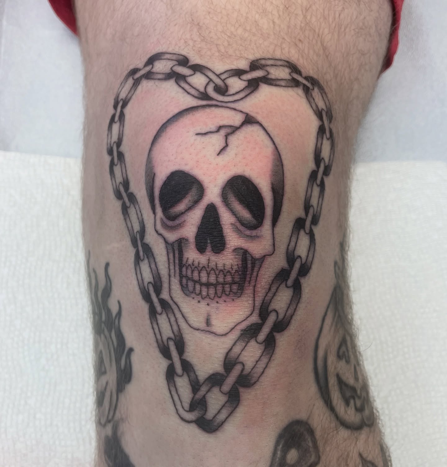 Skull and chain realism tattoo on the forearm by Dayton Tattoo Artist, Miamisburg, Ohio