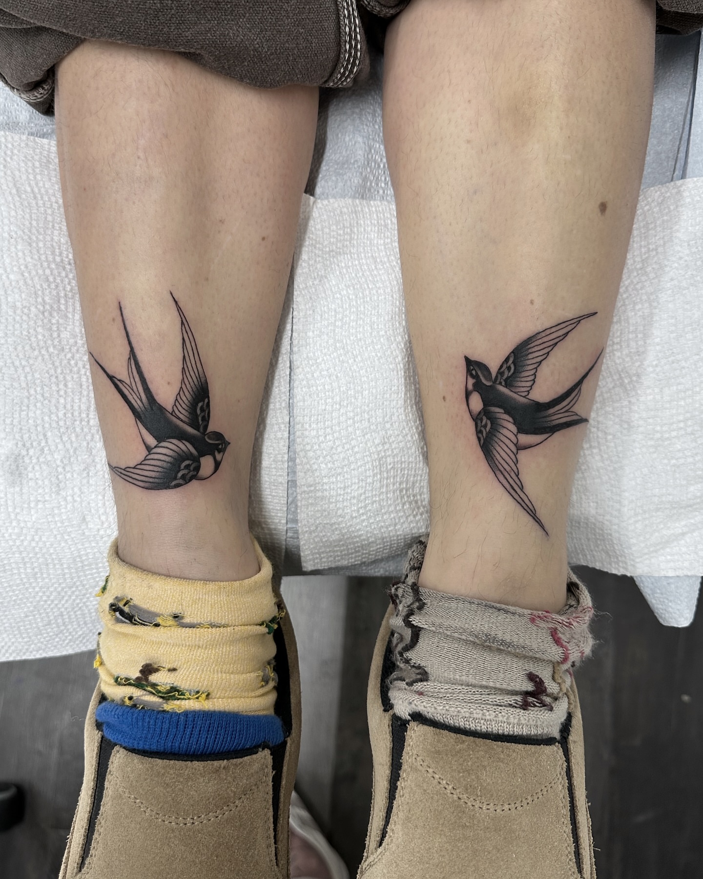 Swallow black and grey tattoo on the leg by Nicholas Lee, San Francisco, California