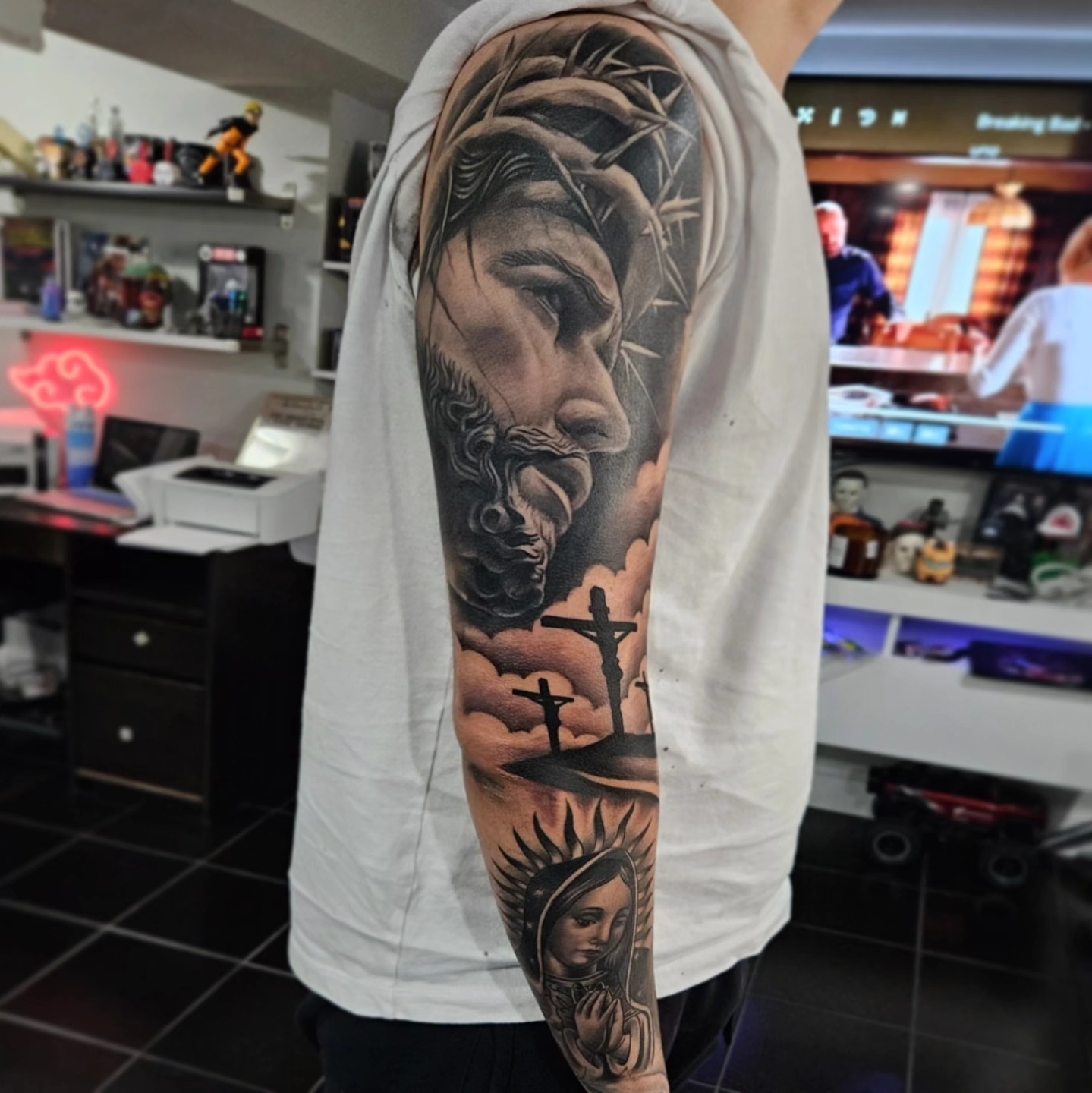Religious scene realism tattoo on the forearm by "El Jose" Tattoo