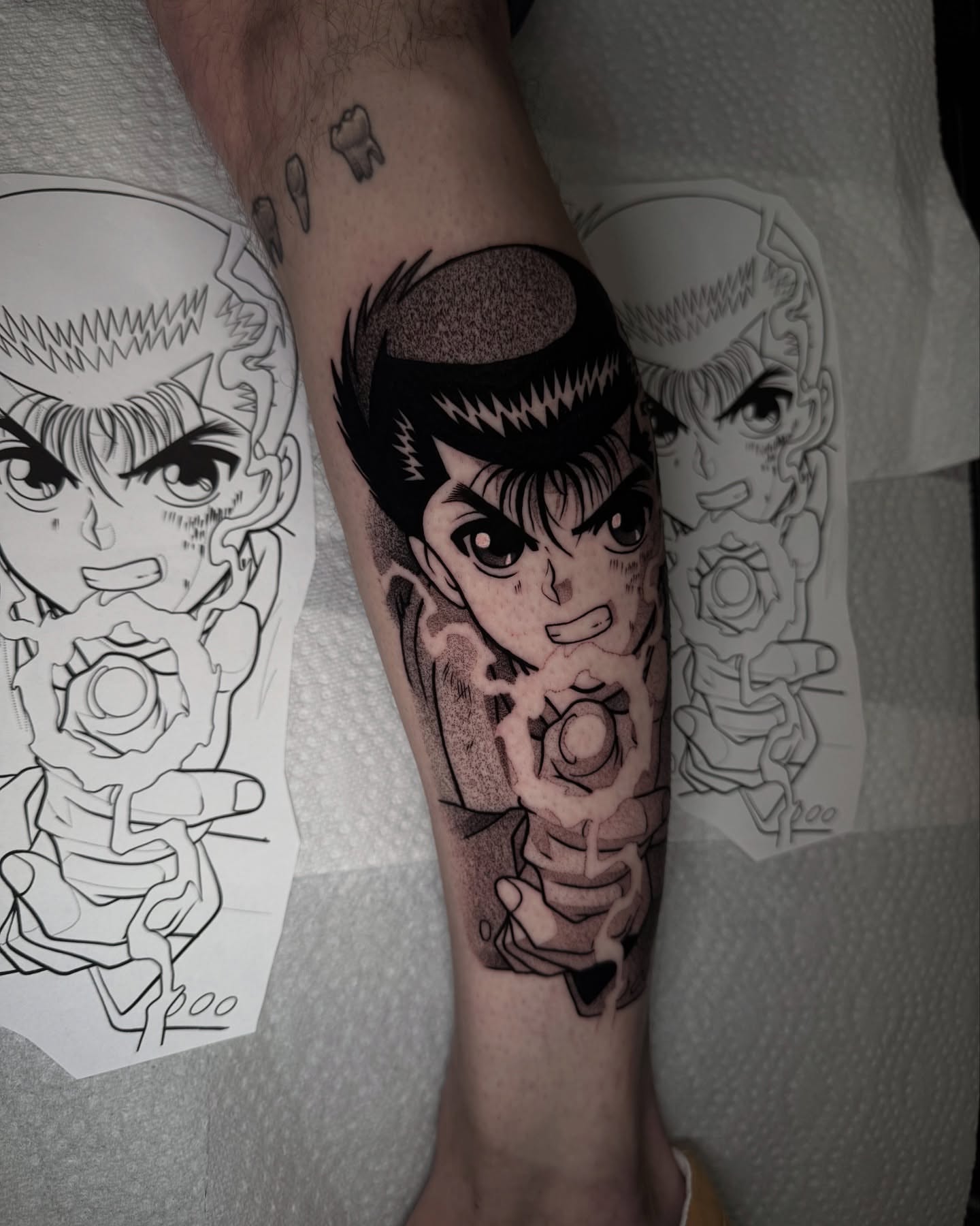 Cyborg character dotwork tattoo on the forearm by Anthony D. Rustik