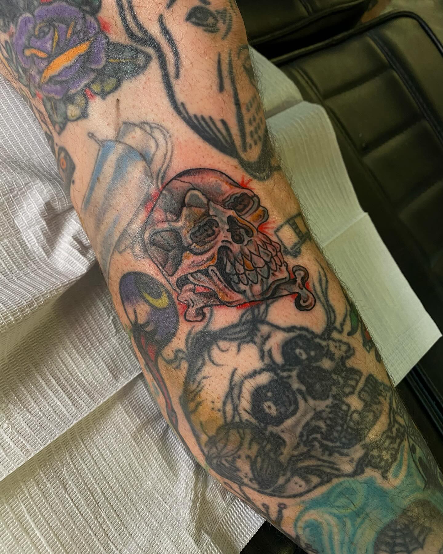Skull American traditional tattoo on the forearm by Chase Skylar Clayton Ogle