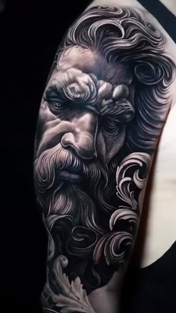 Bearded man's head realism tattoo by Duniel Garcia