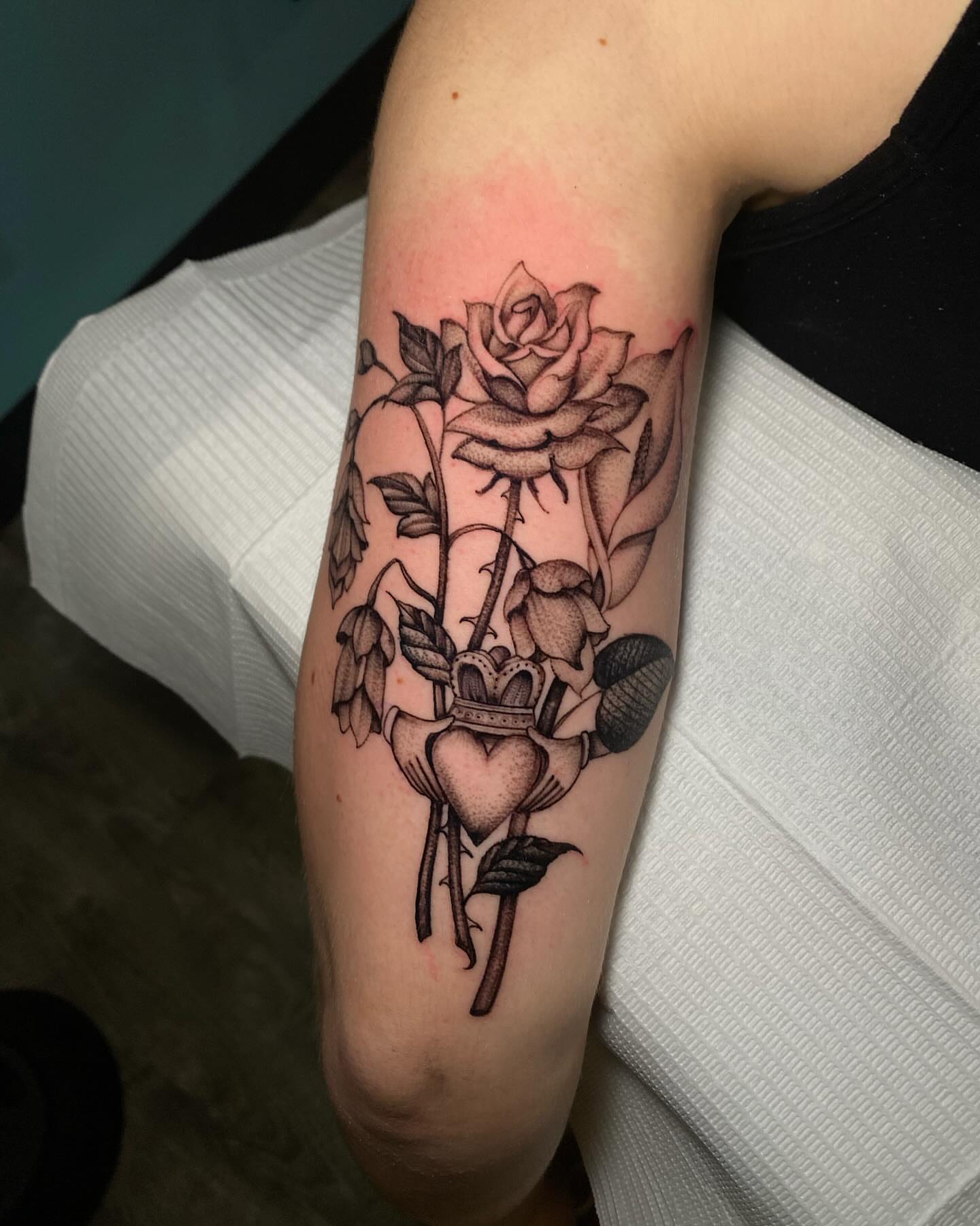 Rose and heart black and grey tattoo on the forearm by Chase Skylar Clayton Ogle