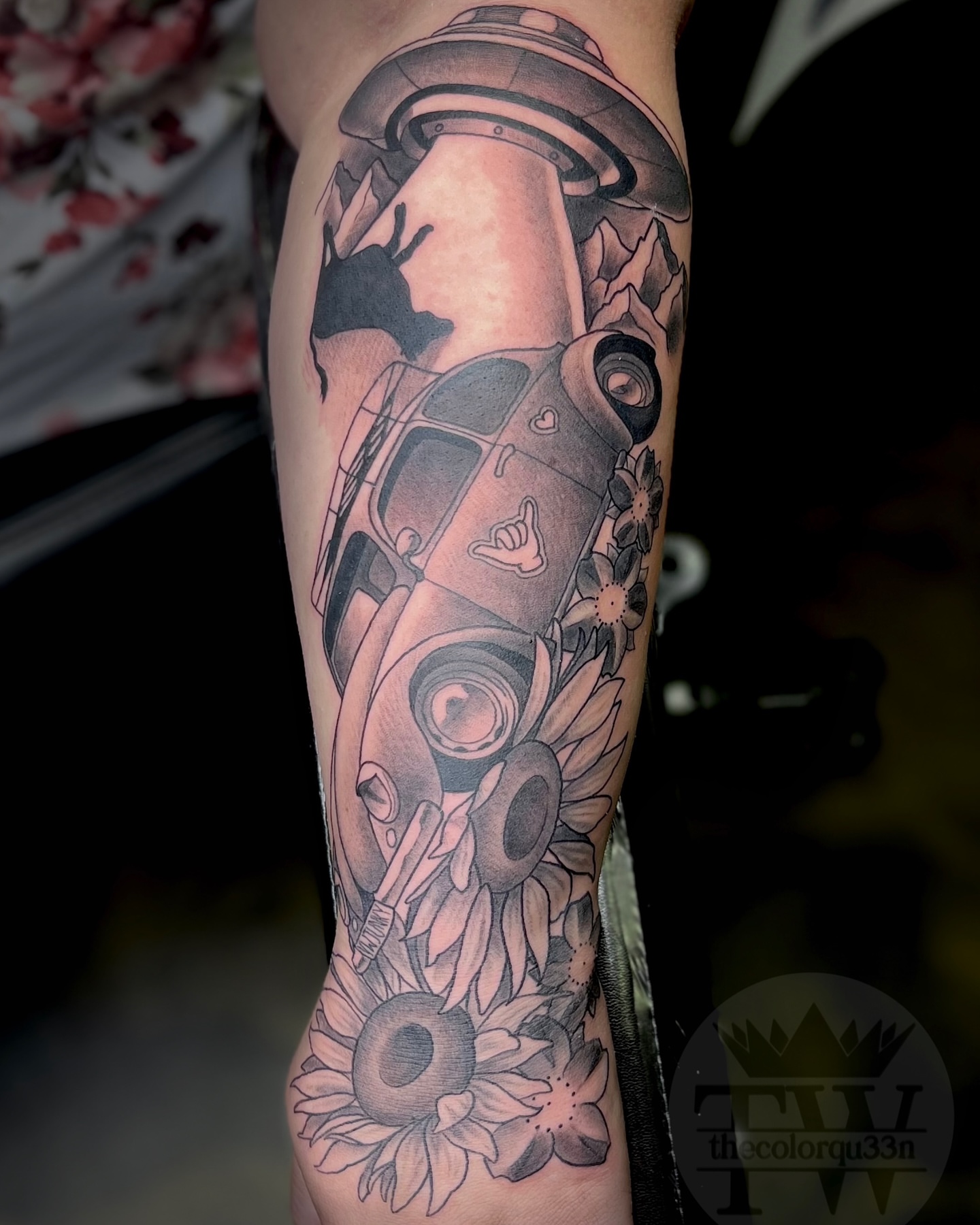 Car and sunflowers realism tattoo on the forearm by Taylor Tha Color Queen