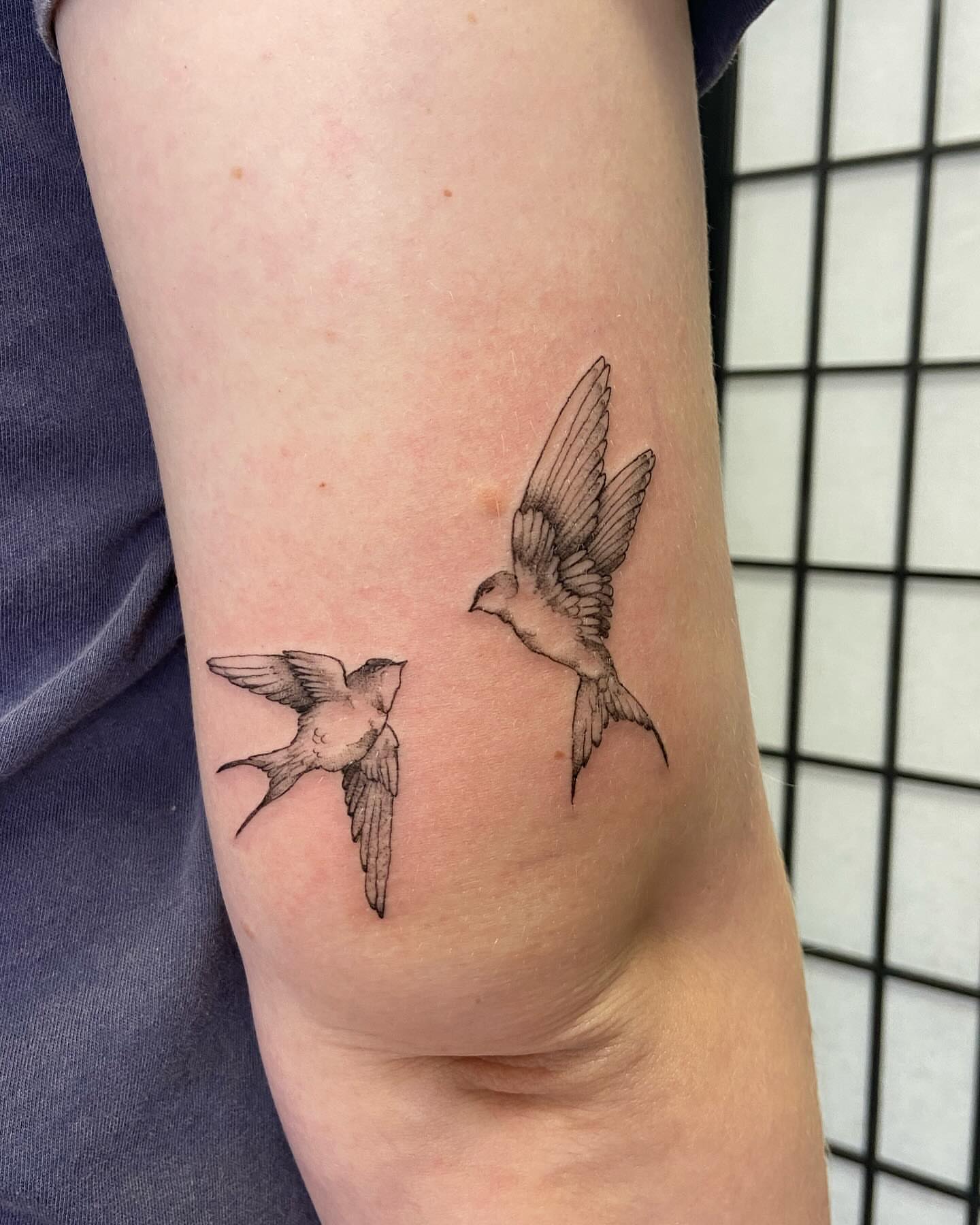 Swallows black and grey tattoo on the forearm by Libbey June @ Snailberry Studios- NW OHIO