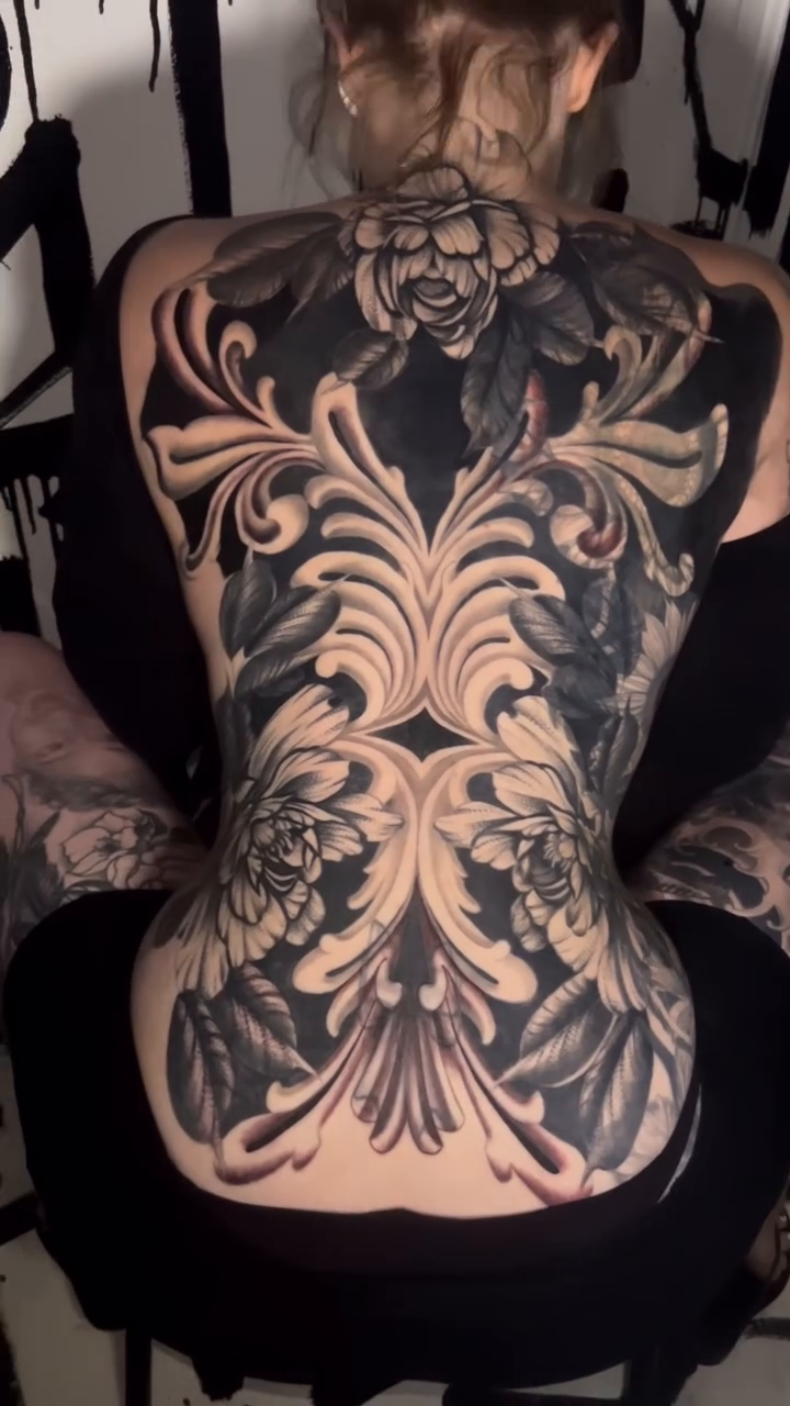 Ornamental scrollwork with floral elements ornamental tattoo by Brittney