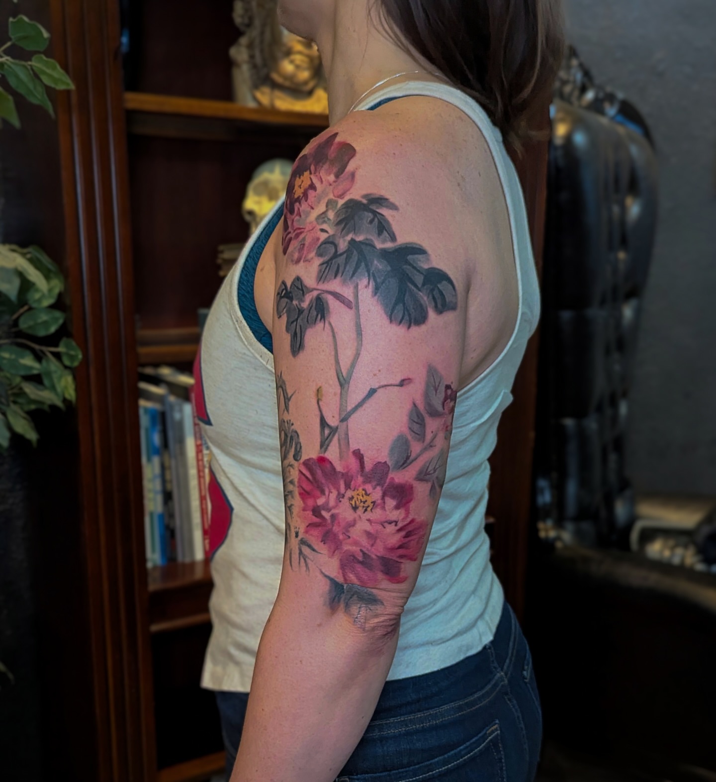 Peony flowers realism tattoo on the upper arm by Jhenn