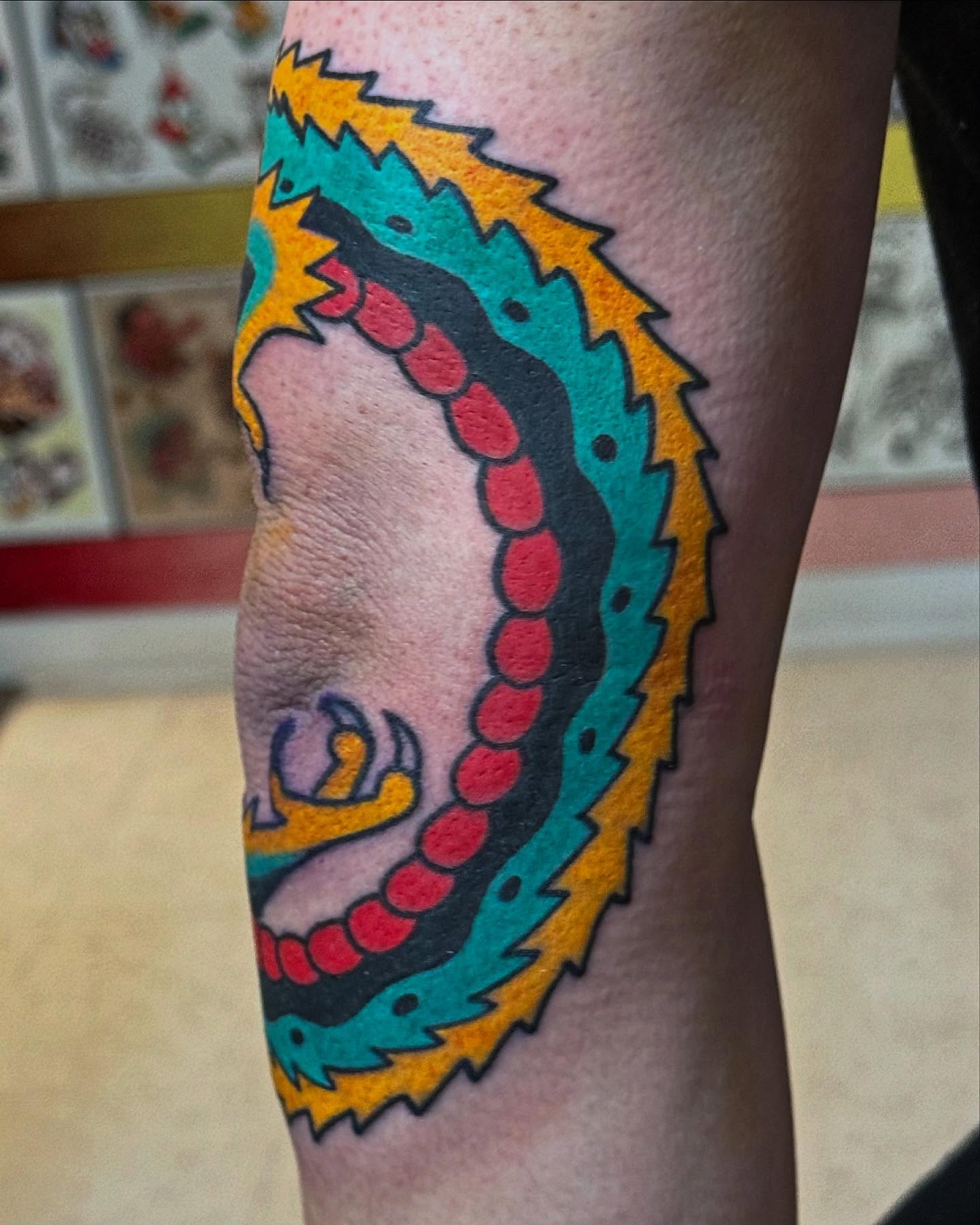 Serpent American traditional tattoo on the forearm by Big Al
