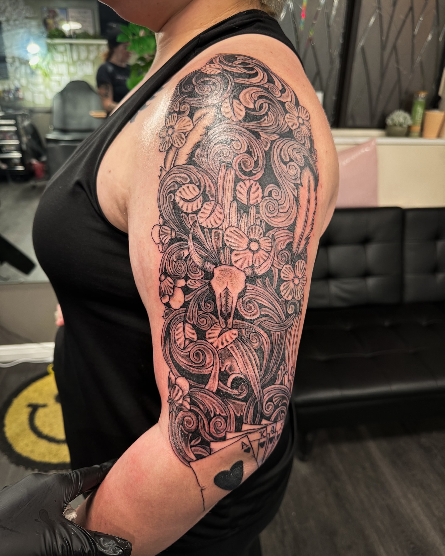 Floral arrangement ornamental tattoo on the upper arm by @inkspirationtattoo_co