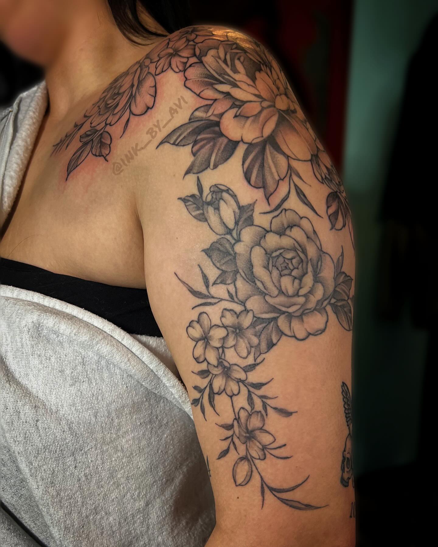 Floral bouquet black and grey tattoo on the shoulder by Avi, Cleveland, Ohio