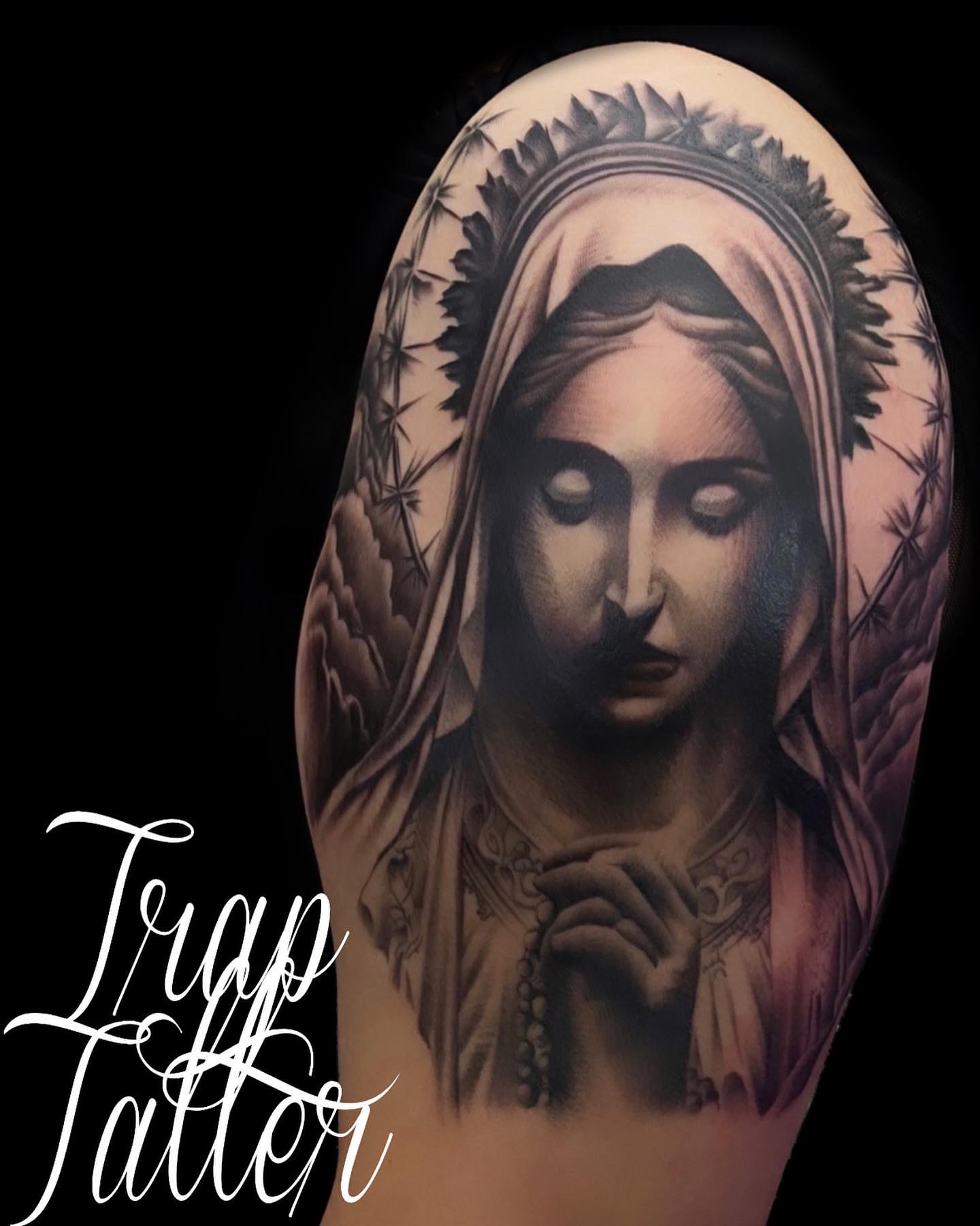 Religious figure realism tattoo on the forearm by TattooBoyTattoos