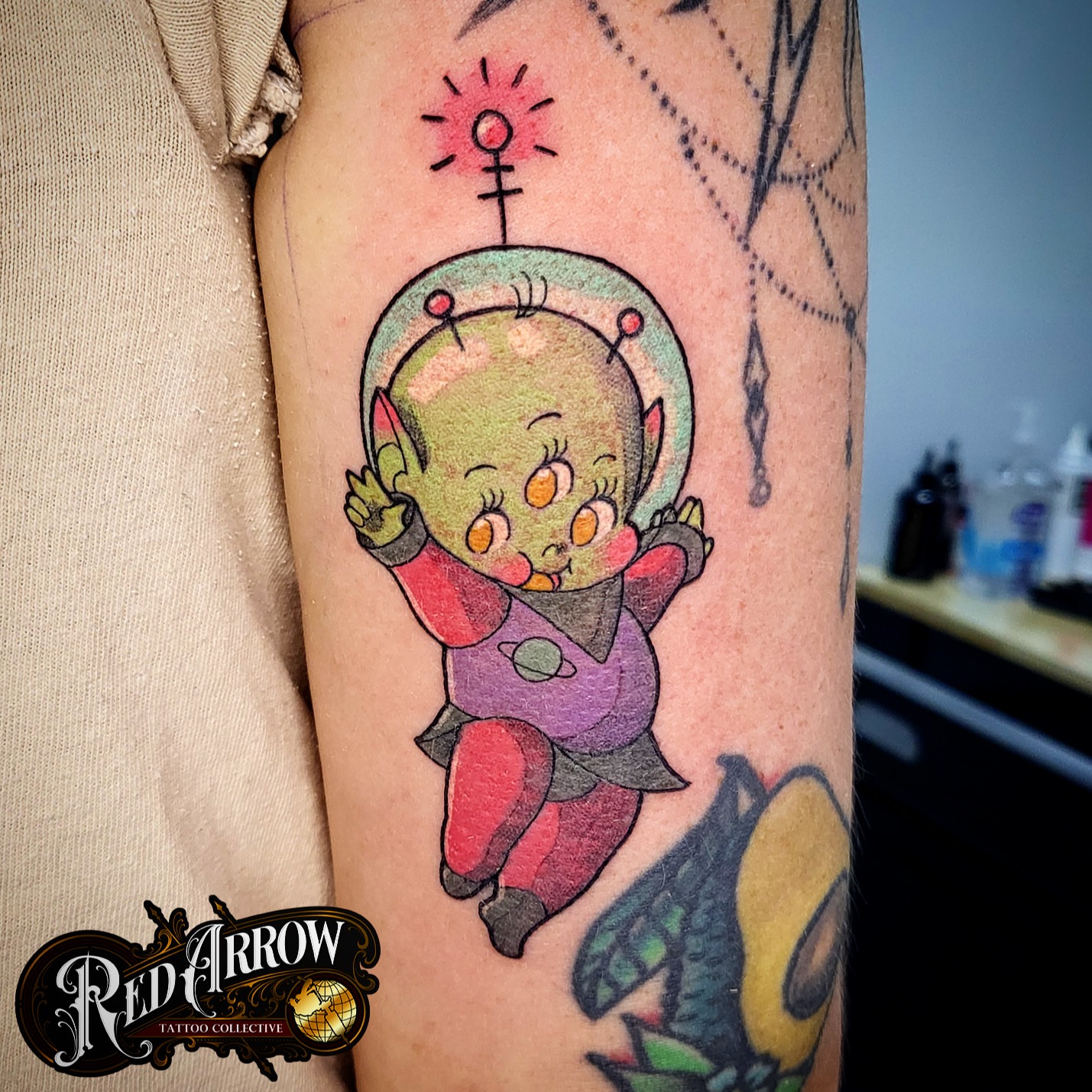Alien baby in space helmet anime tattoo on the forearm by 𝕽𝖊𝖉 𝕬𝖗𝖗𝖔𝖜 𝕿𝖆𝖙𝖙𝖔𝖔 𝕮𝖔𝖑𝖑𝖊𝖈𝖙𝖎𝖛𝖊, Troy, Michigan