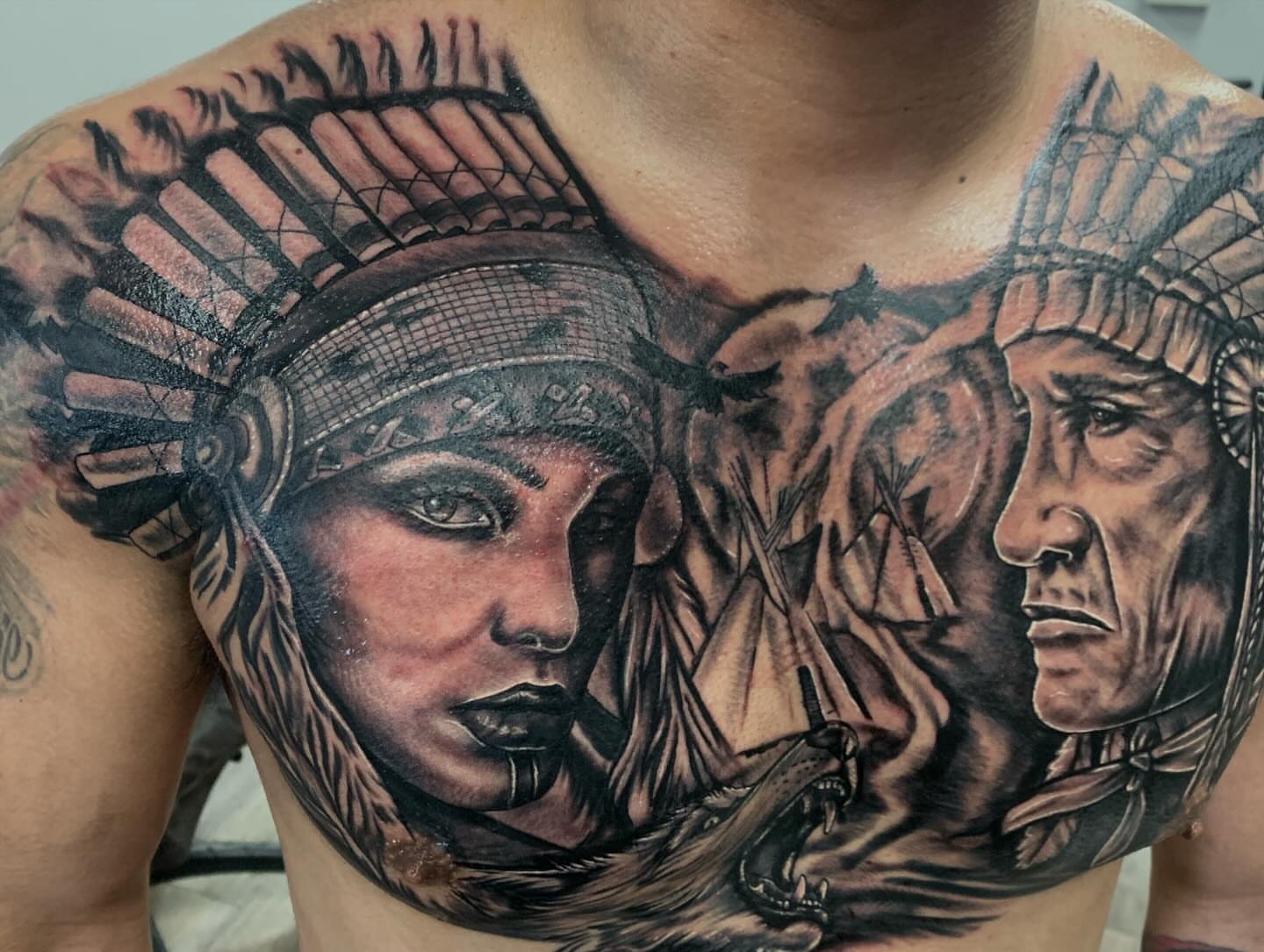 Indian headdress realism tattoo on the chest by Tonii Florrez