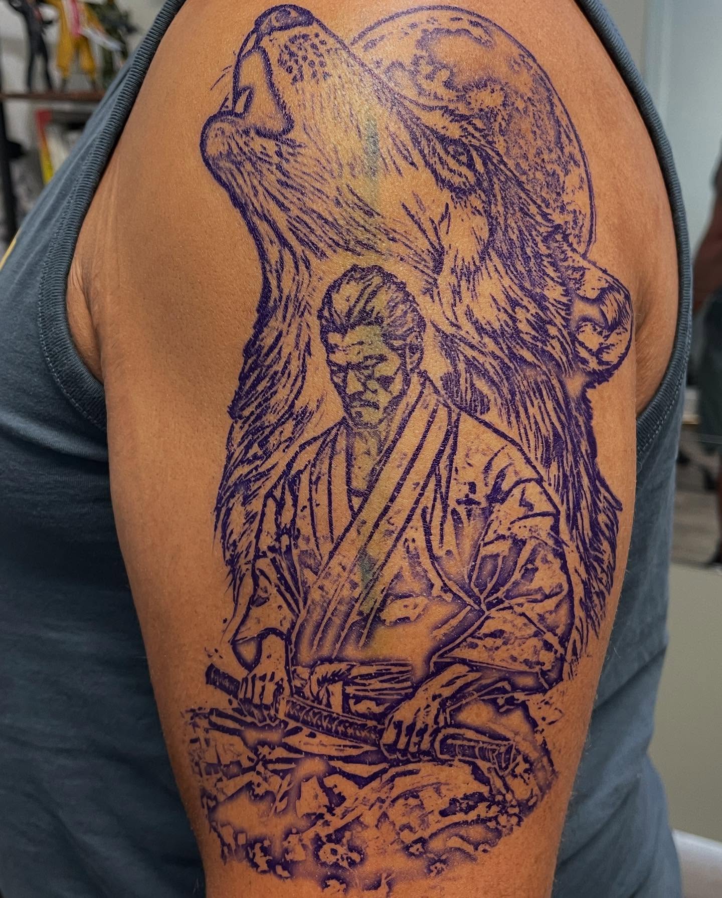 Samurai and wolf realism tattoo on the shoulder by Nicholas Capellan, Winter Park, Florida