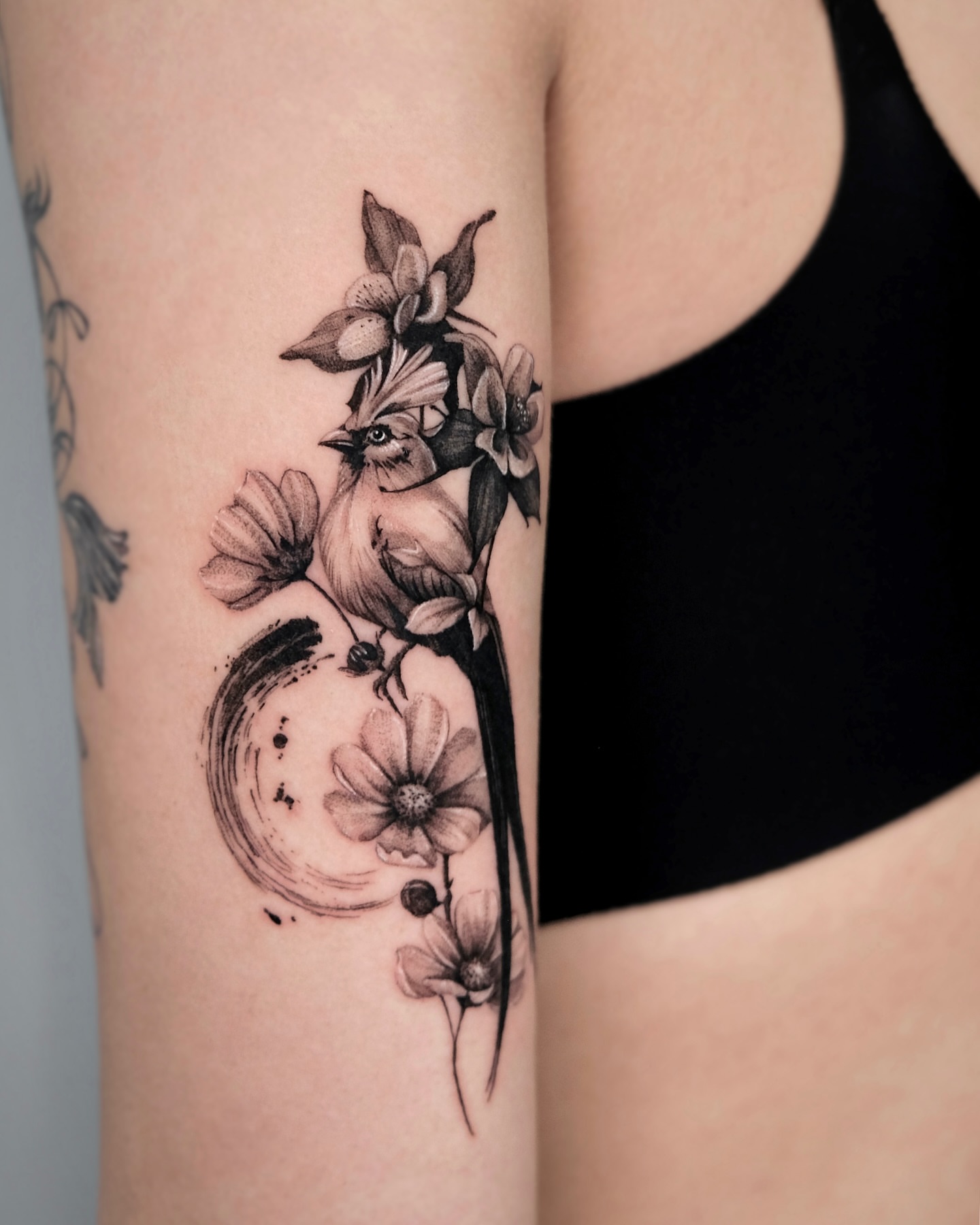 Bird and flowers realism tattoo on the forearm by Da-An ･ﾟ✧ 다 안 𓇬˖