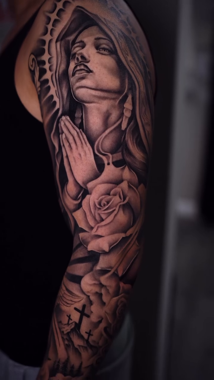Virgin Mary with roses and crosses realism tattoo by Esto