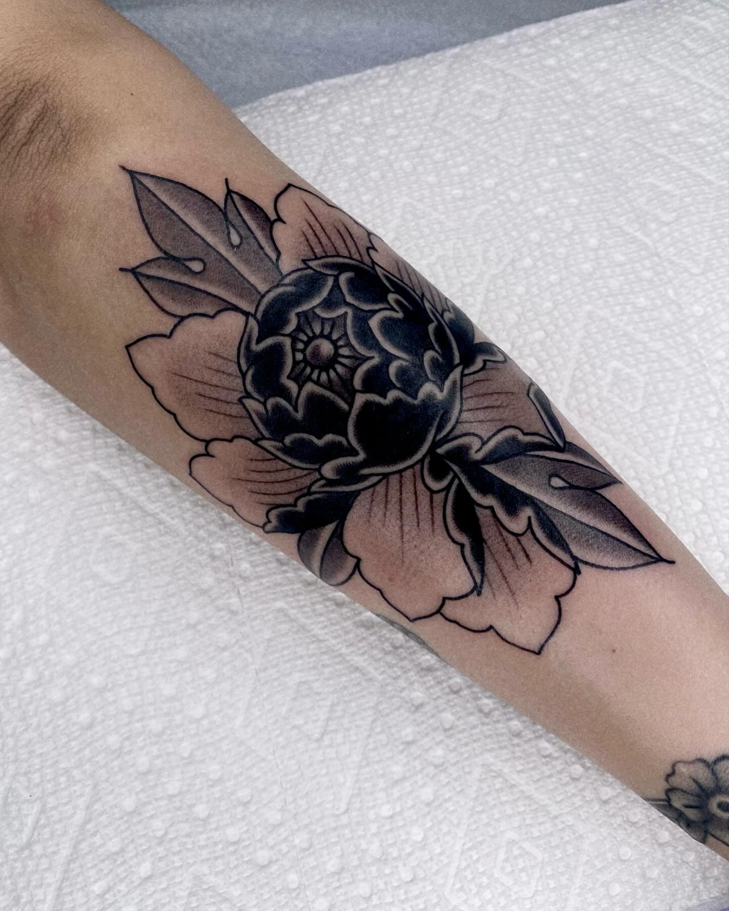 Peony black and grey tattoo on the forearm by Justin R. Mitchell, Fort Worth, Texas