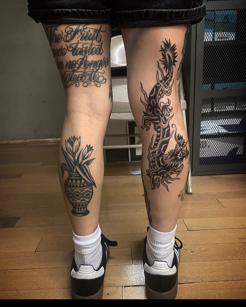 Vase with tulips black and grey tattoo on the calf by Alan Pham, San Jose, California