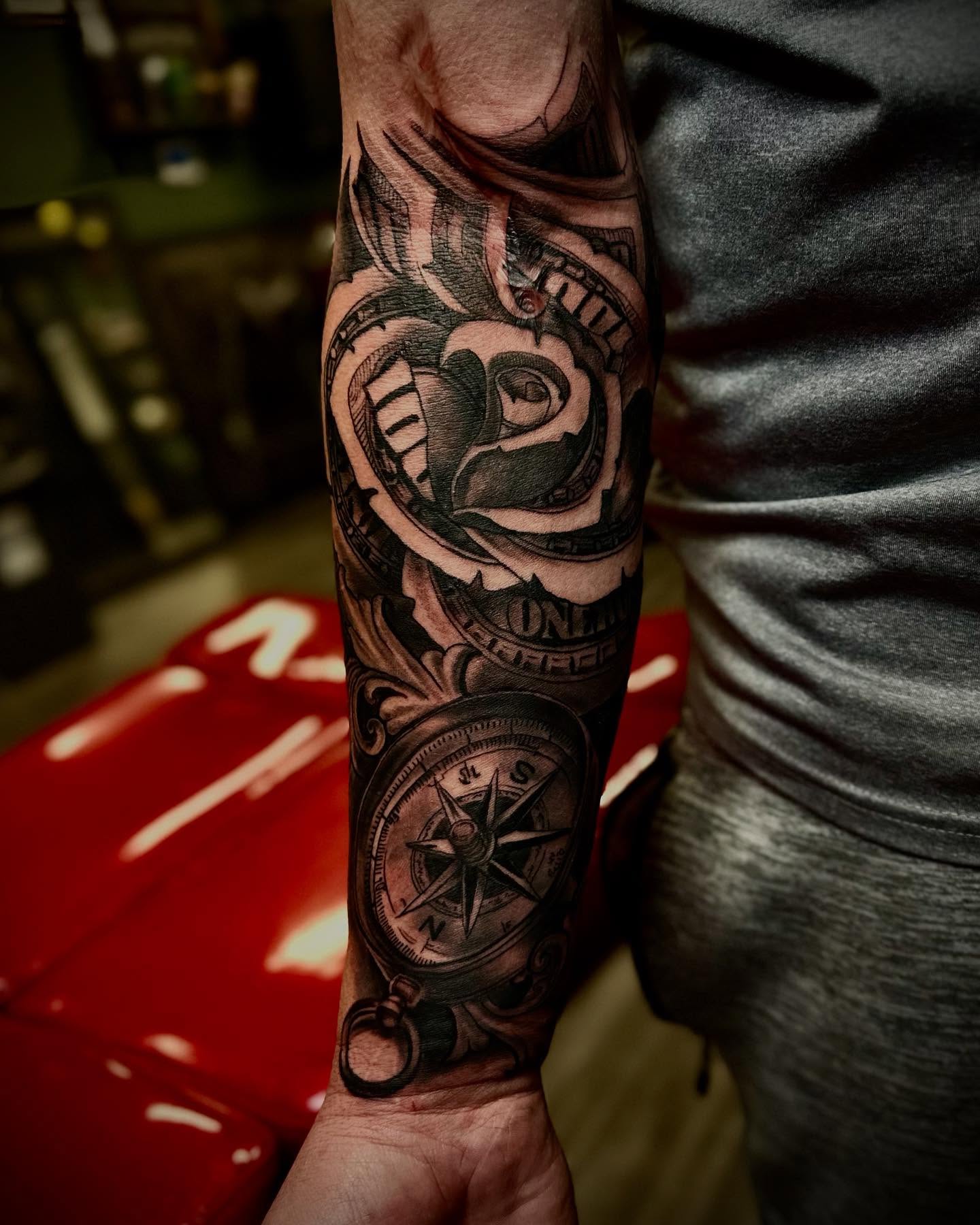 Compass and rose realism tattoo on the forearm by Tattoo Artist Ian Day (Everlasting_Art_Ink)