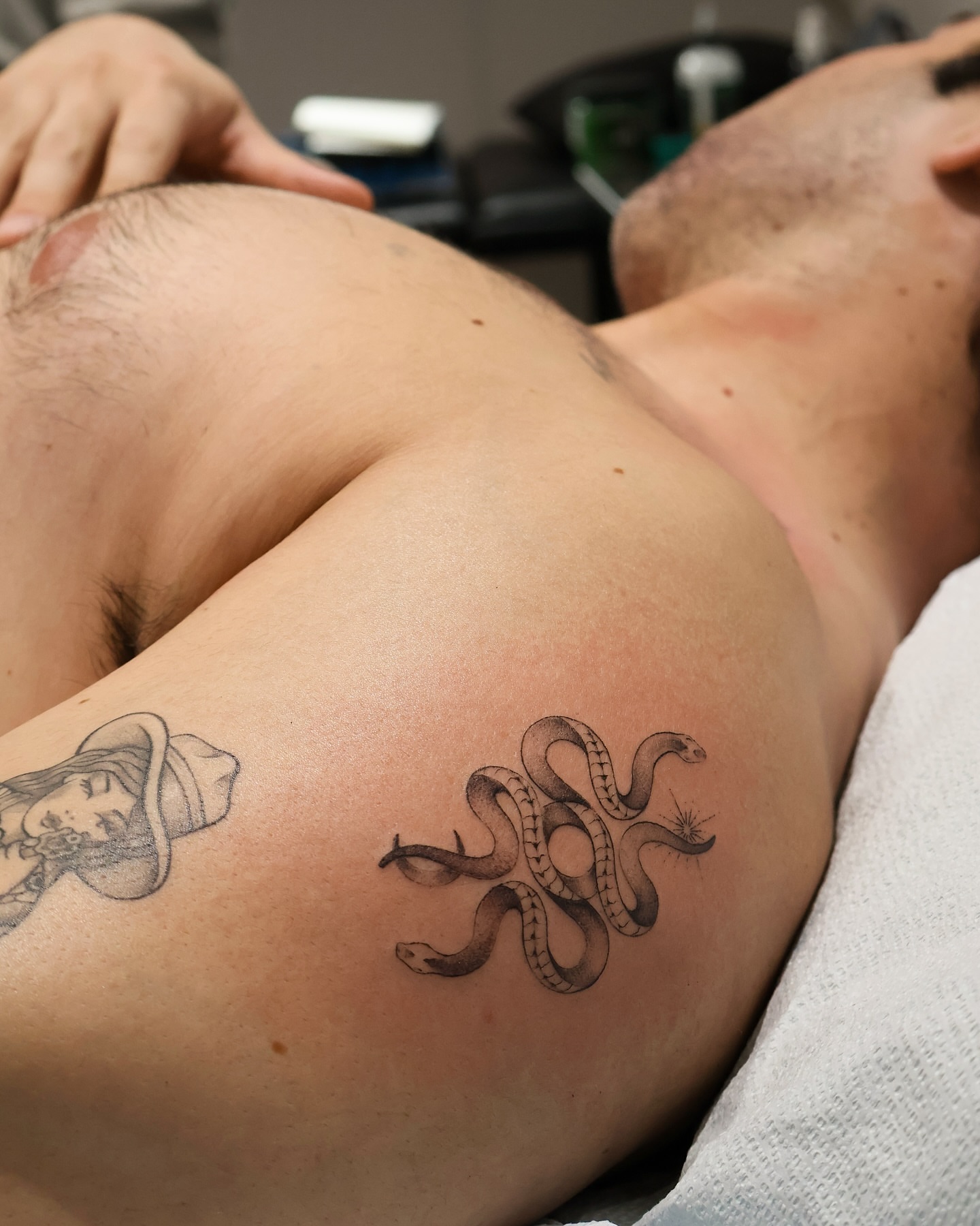 Snakes black and grey tattoo on the chest by Grace Zarmina Hessam