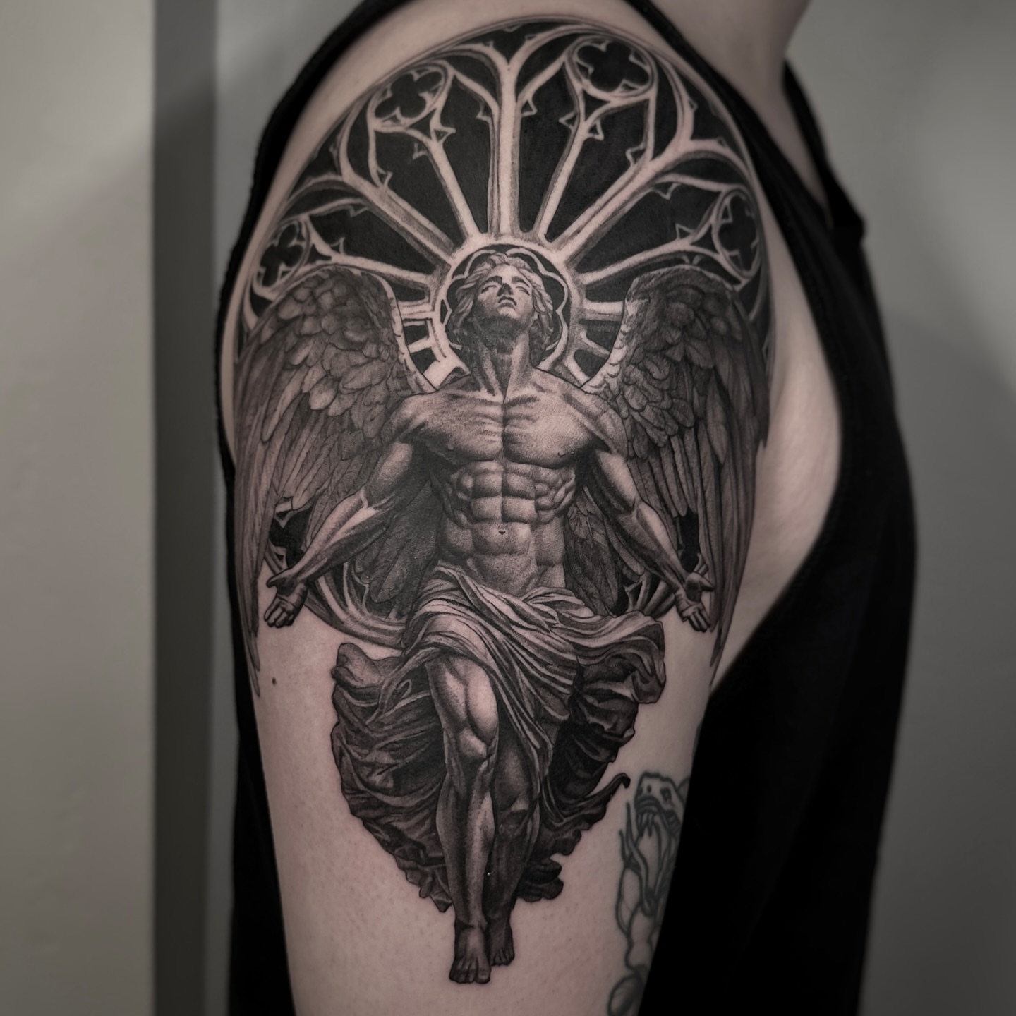 Angelic figure realism tattoo on the shoulder by Paige Jean