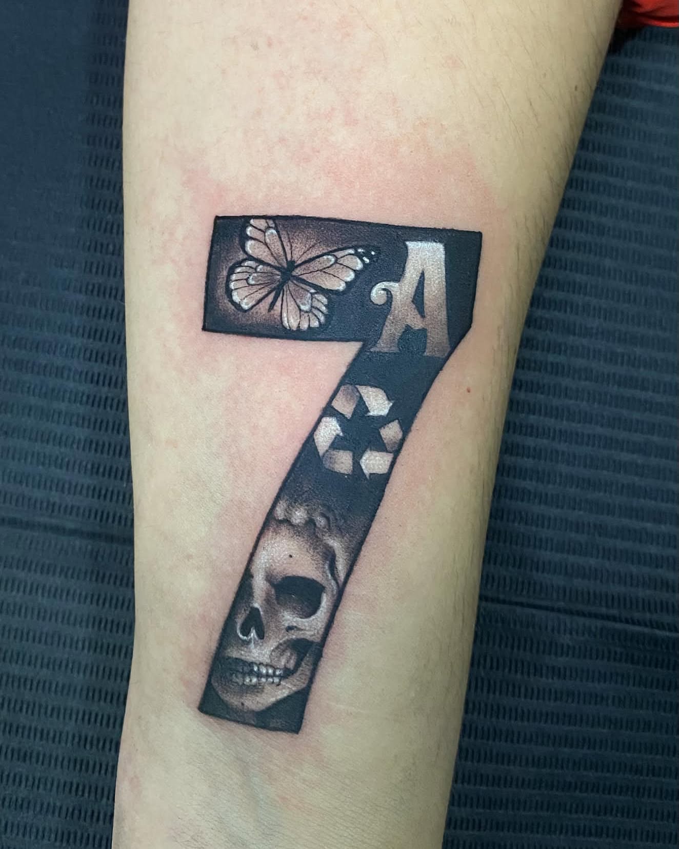Tattoo by @aifos_arts94 — black_and_grey, realism