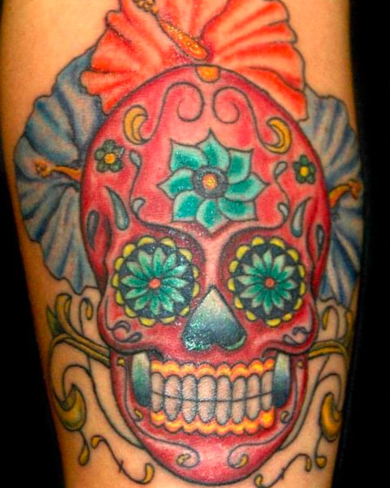 Sugar skull Chicano tattoo on the forearm by Josh Green