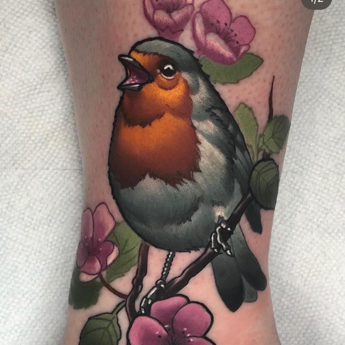 European robin realism tattoo on the forearm by Emily Walker