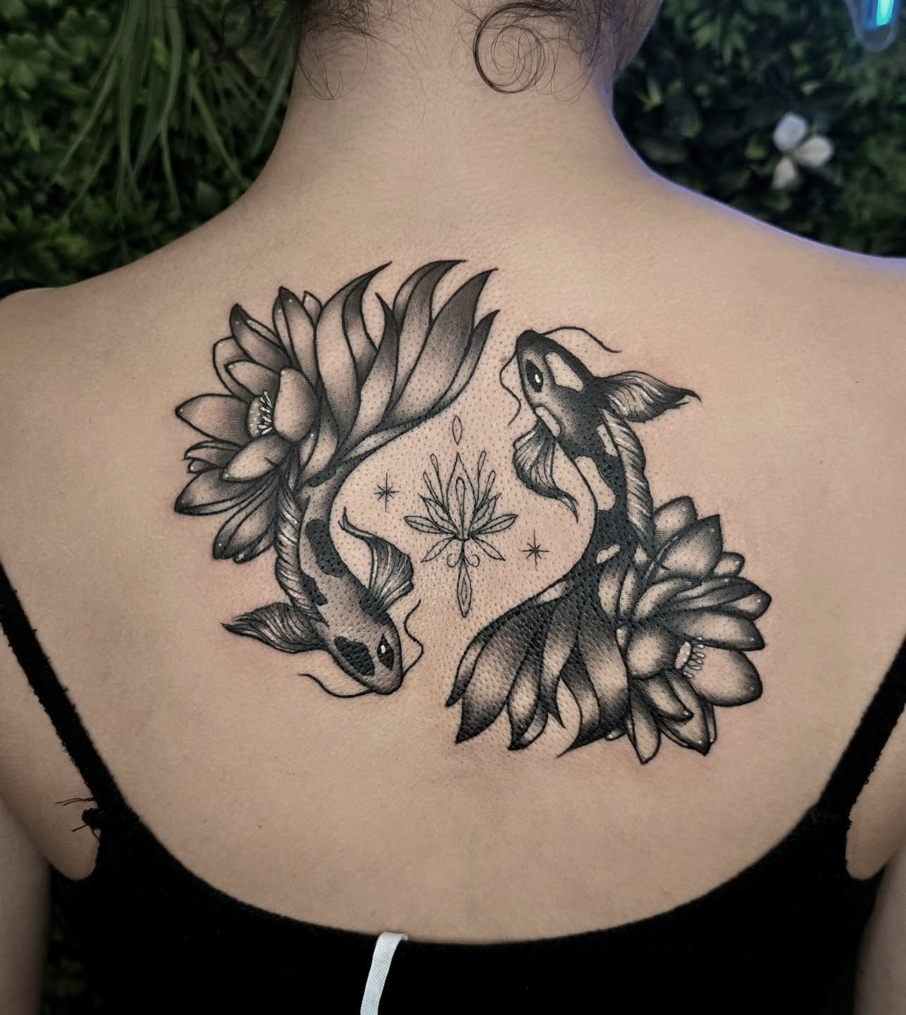 Koi fish and lotus flowers dotwork tattoo on the back by ✮ Monarch Tattoos ✮