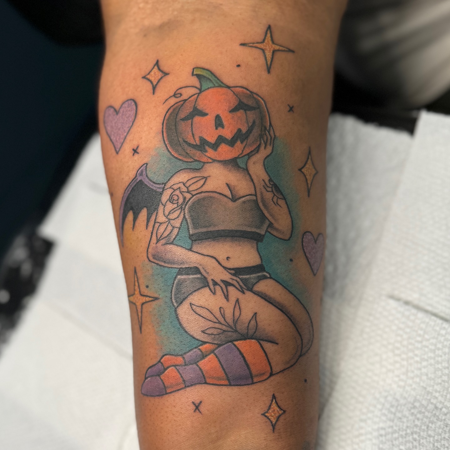 Pumpkin-headed woman American traditional tattoo on the forearm by Ashley Rose - Minnesota Tattoo Artist