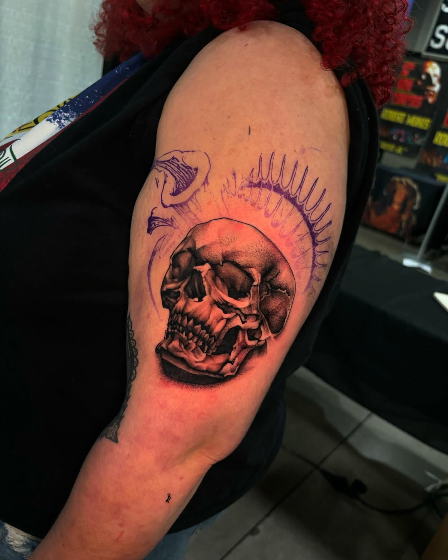 Skull realism tattoo on the shoulder by orlando
