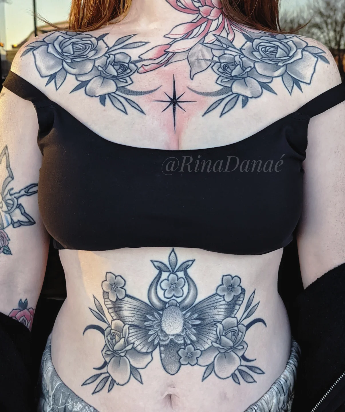 Floral arrangement American traditional tattoo on the torso by Rina Danaé Tattoo🌿