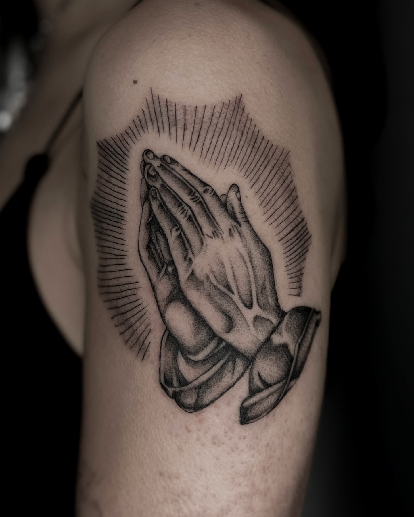 Praying hands black and grey tattoo on the forearm by @sadfoo_tattoo, Austin, Texas