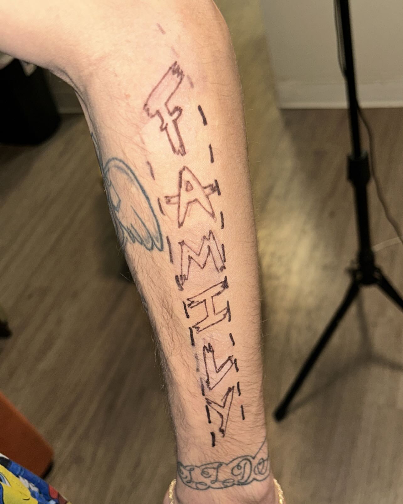 Family lettering script tattoo on the forearm by 702tattoo💉🩸