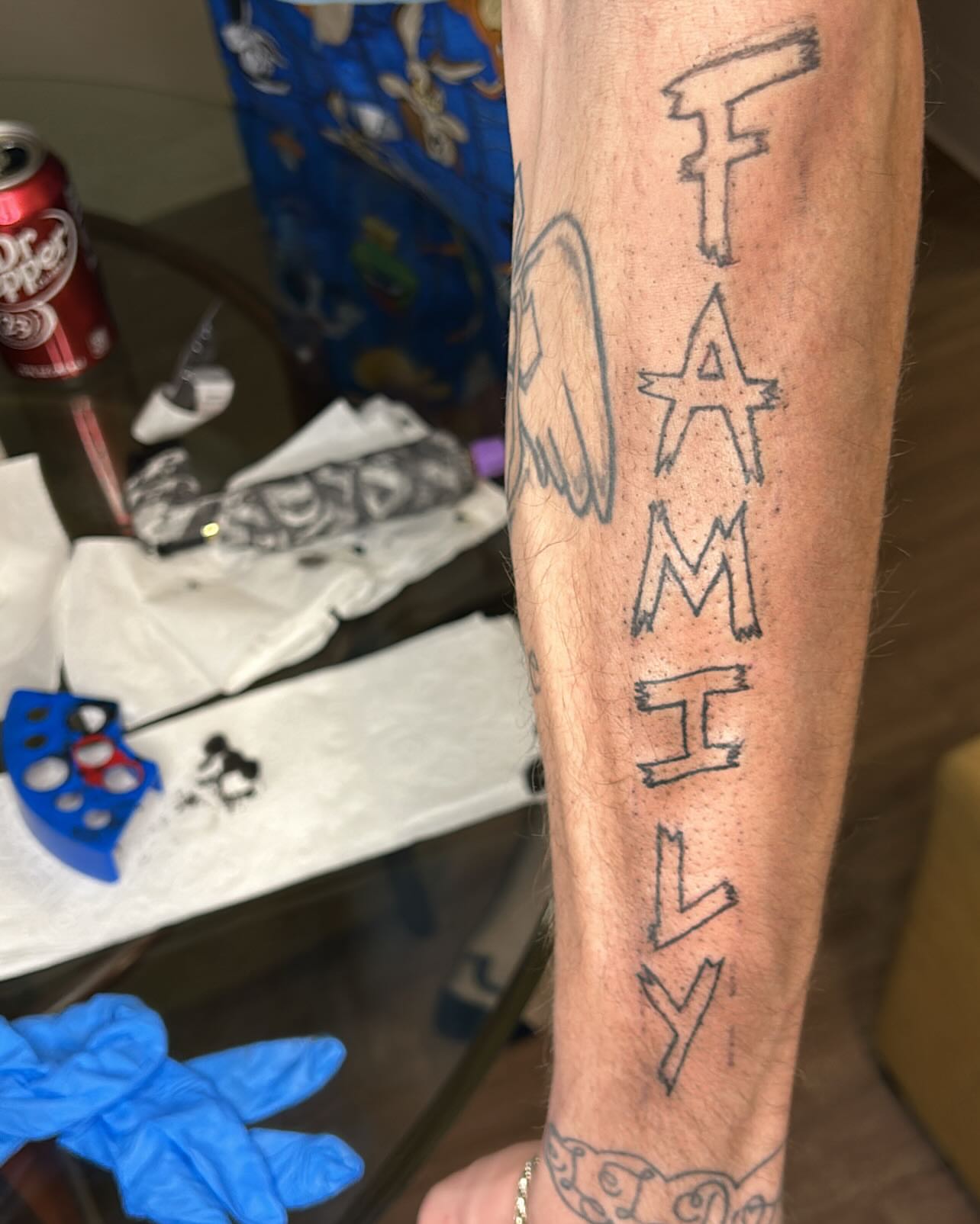 Family lettering script tattoo on the forearm by 702tattoo💉🩸