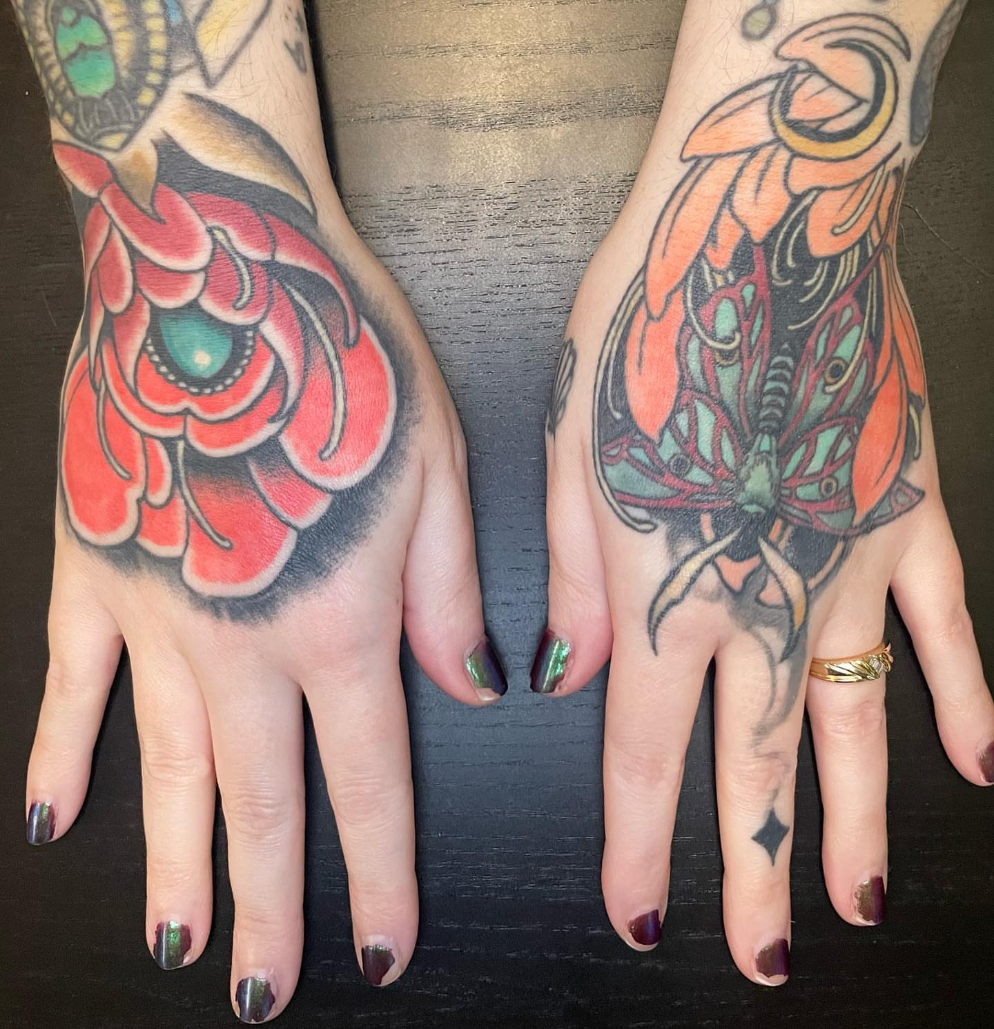 Flower American traditional tattoo on the hand by Seattle Tattoo Artist, Bonney Lake, Washington