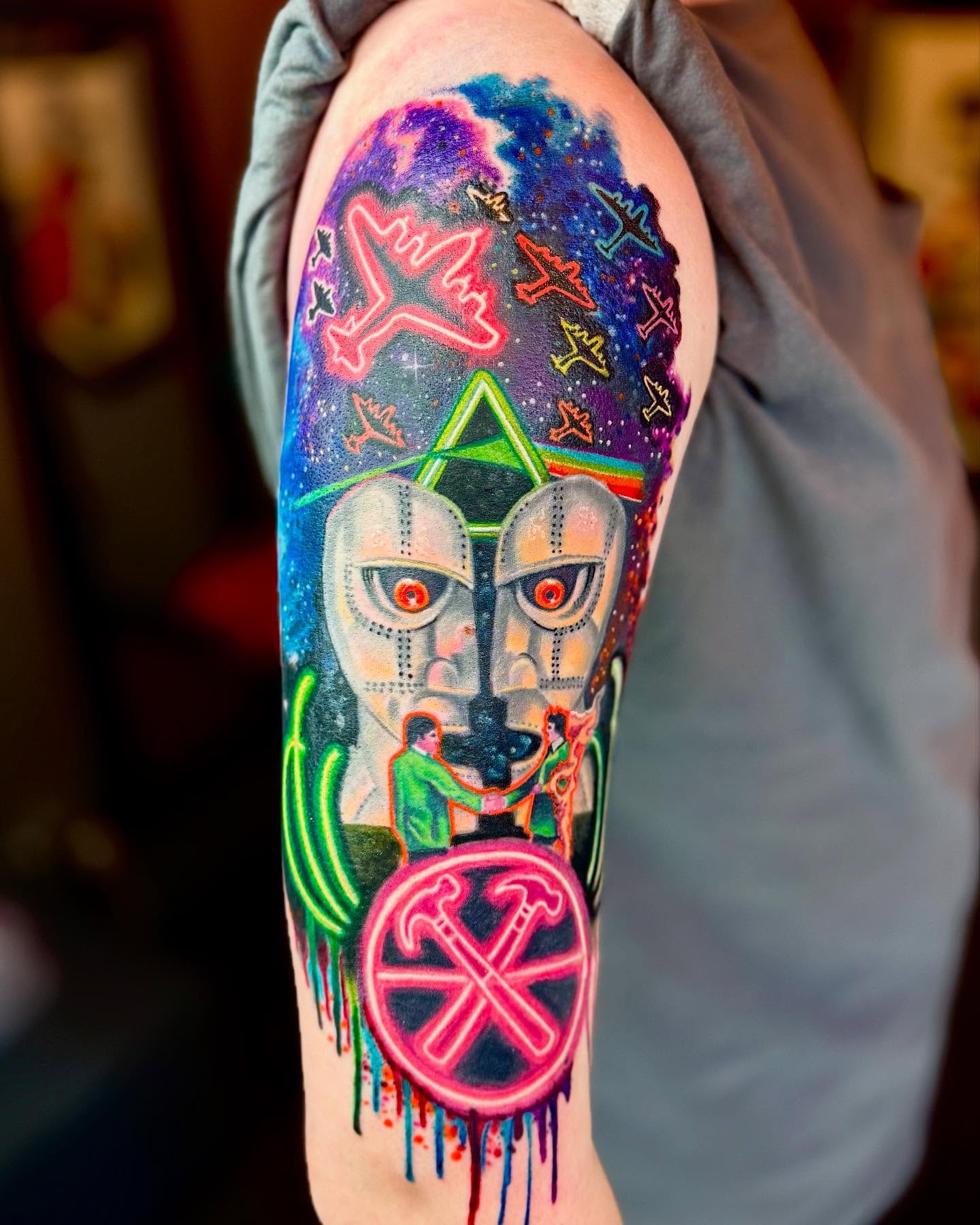 Space-themed mask geometric tattoo on the forearm by Bacon 🥓